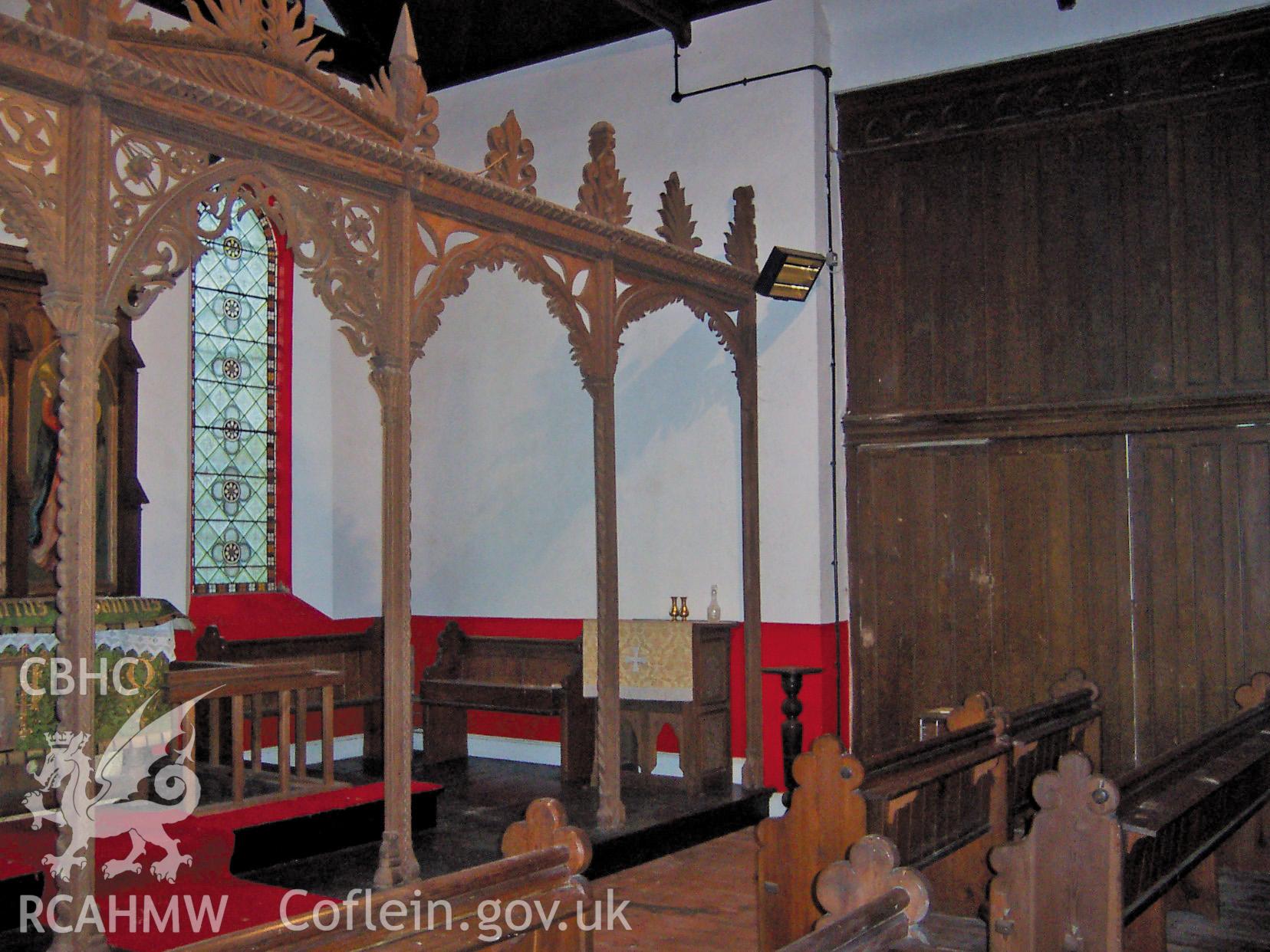 Colour digital photograph of the altar and East window, South side.