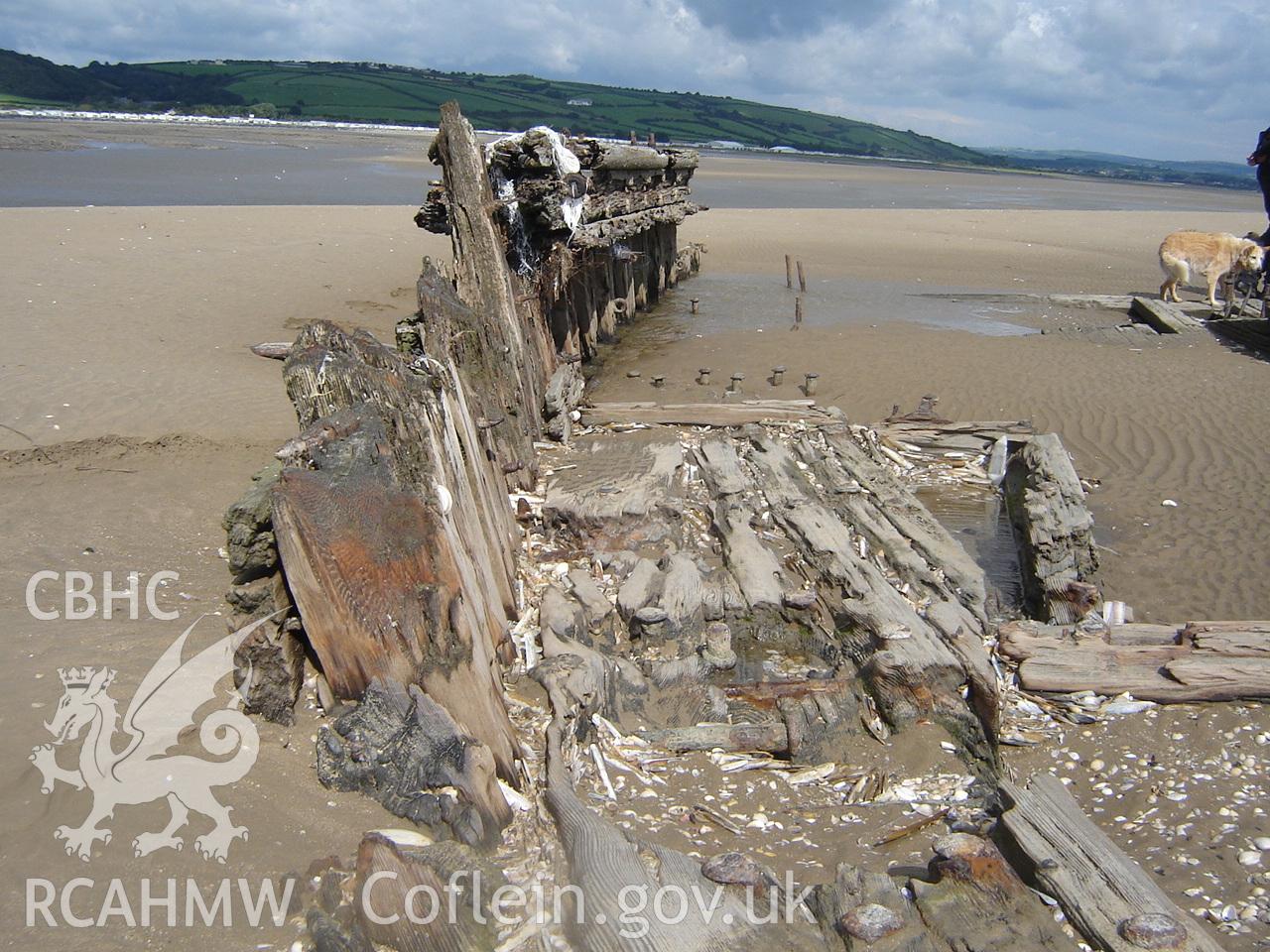Digital photograph showing the wreck of the Paul at Cefn Sidan, produced by Ian Cundy, August 2012.