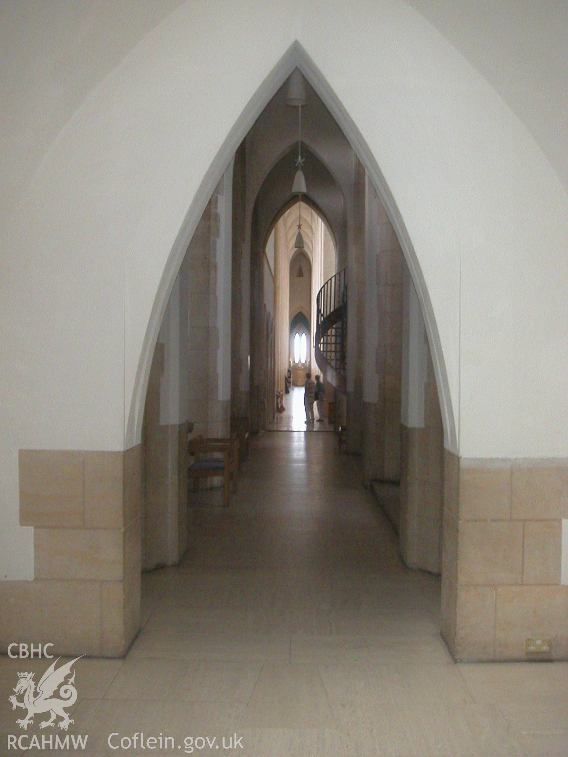 Digital image of an aisle arch at Guildford Cathedral: 'Herbert Luck North. Arts and Crafts Architecture for Wales', page 89.