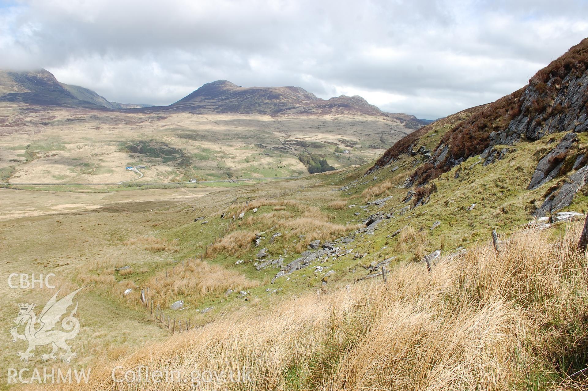 Fence running to mountain wall, from S. Scale 1m (Kenney, J, 21/05/2013)