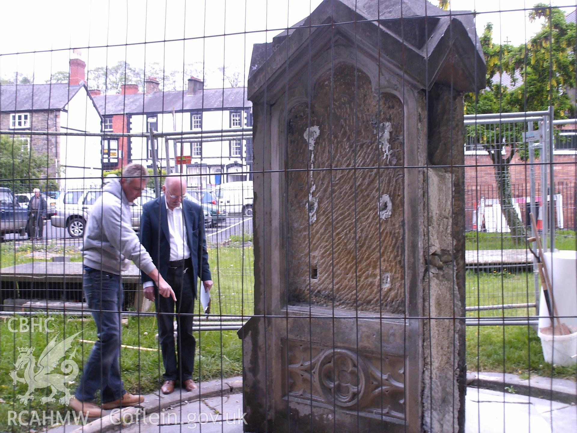 Digital image showing the memorial plaques and corner pillars being removed.
