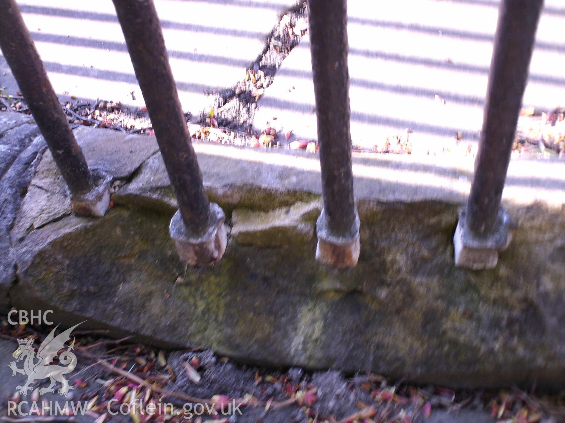 Digital image showing the crumbling state of the monument's kerb stones.
