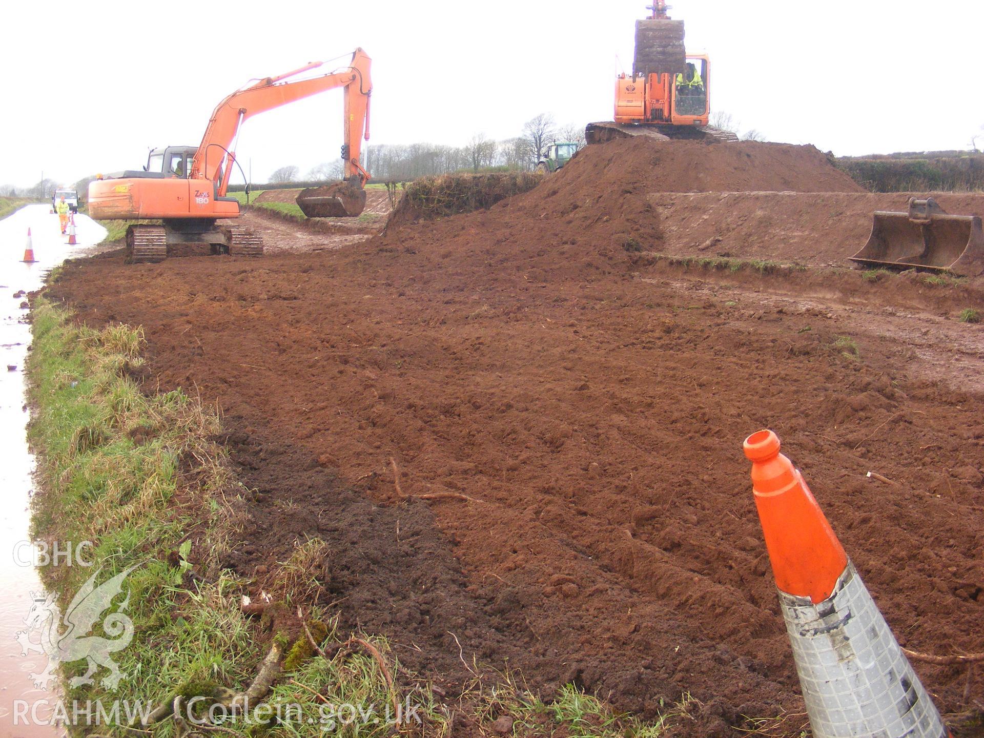 View showing general shot - entrance area hedge removed, taken at archaeological watching brief at Princes Gate Spring Water, produced by Headland Archaeology (UK) Ltd., 2014.
