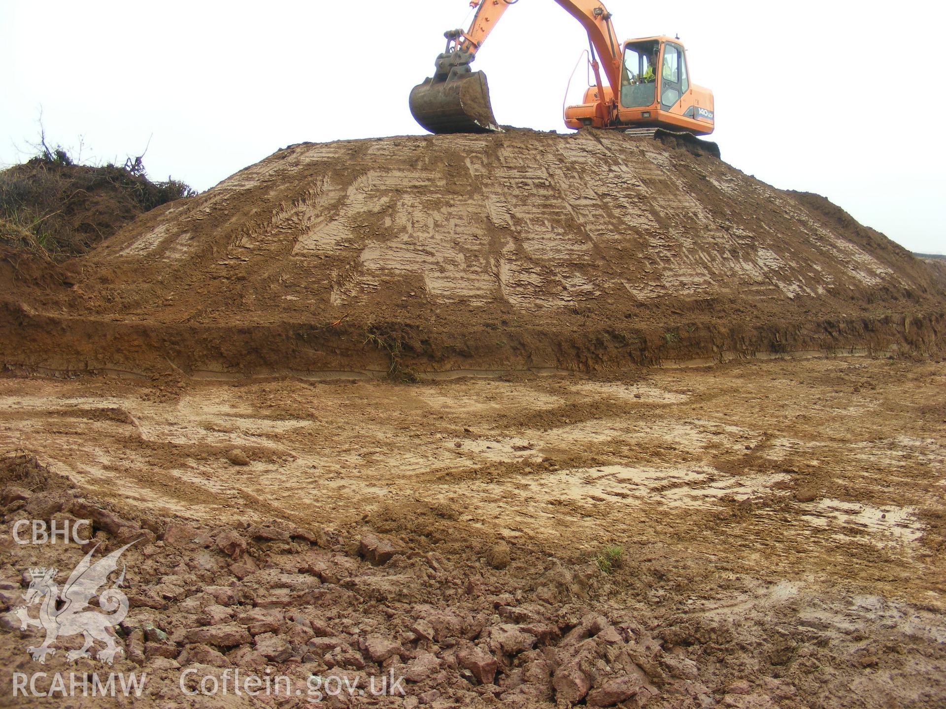 View showing general shot - entrance area hedge removed and stripped, looking north, taken at archaeological watching brief at Princes Gate Spring Water, produced by Headland Archaeology (UK) Ltd., 2014.