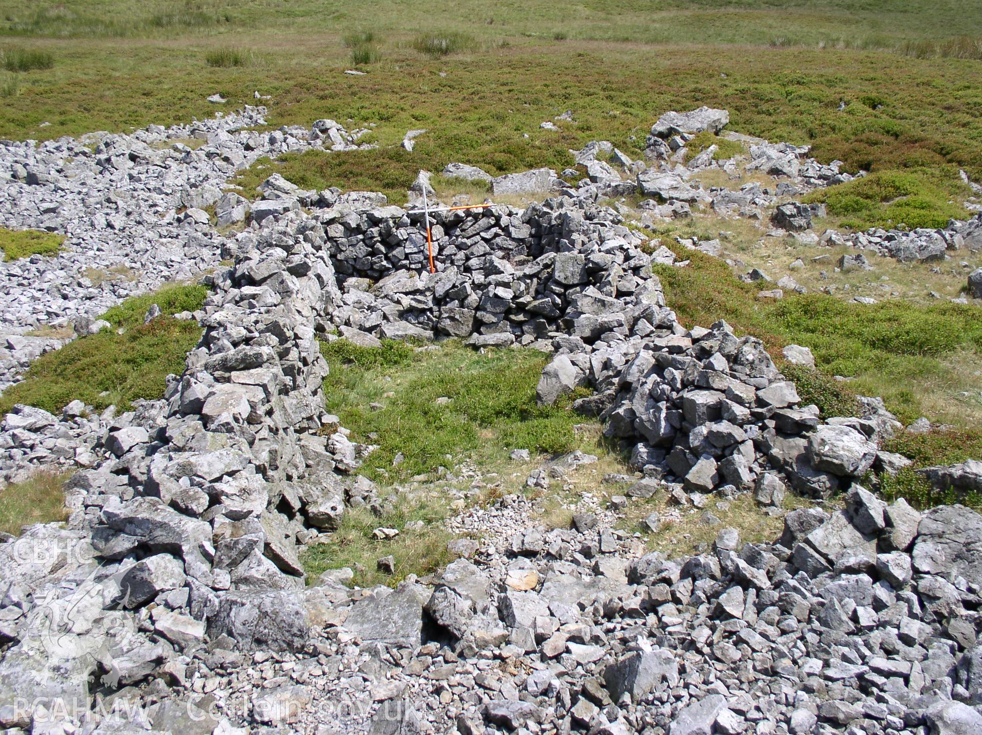 Photograph of Twr Pen-cyrn Sheepfold taken on 12/07/2005 by J.B. Winterburn during an Upland Survey undertaken by John Winterburn Archaeological Services.