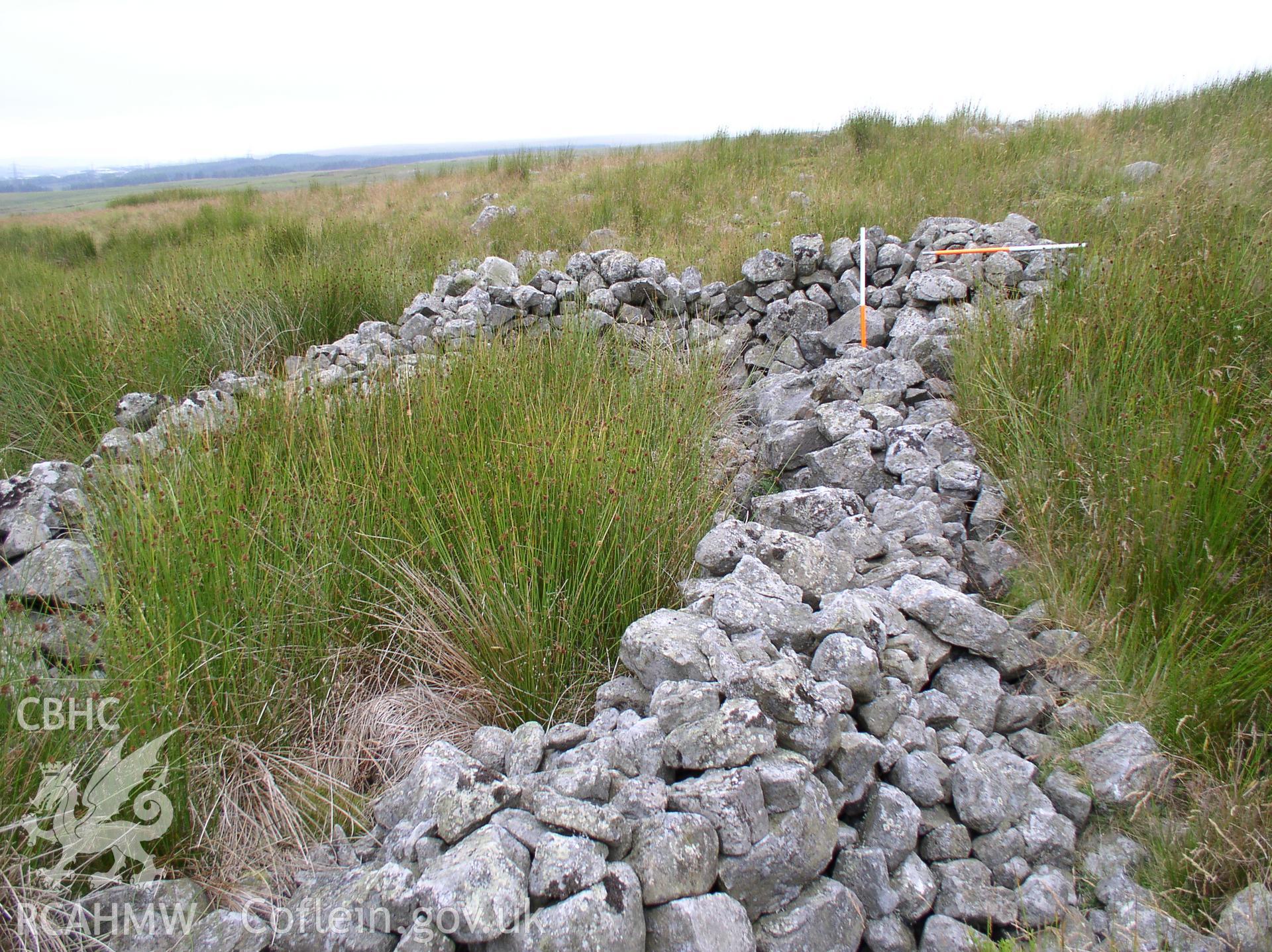 Photograph of Cefn Pwll Coch Pile of Stone taken on 13/07/2005 by J.B. Winterburn during an Upland Survey undertaken by John Winterburn Archaeological Services.