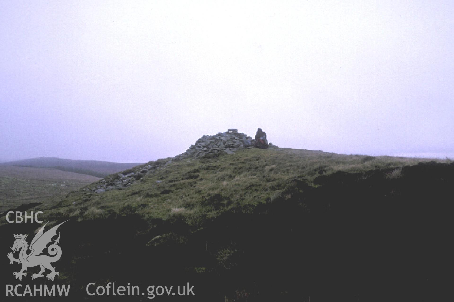 Photograph of Careg-y-caws Cairn from the south-west. Taken by R. Hankinson on 23/11/2004 during an upland survey undertaken by the Clwyd-Powys Archaeological Trust.