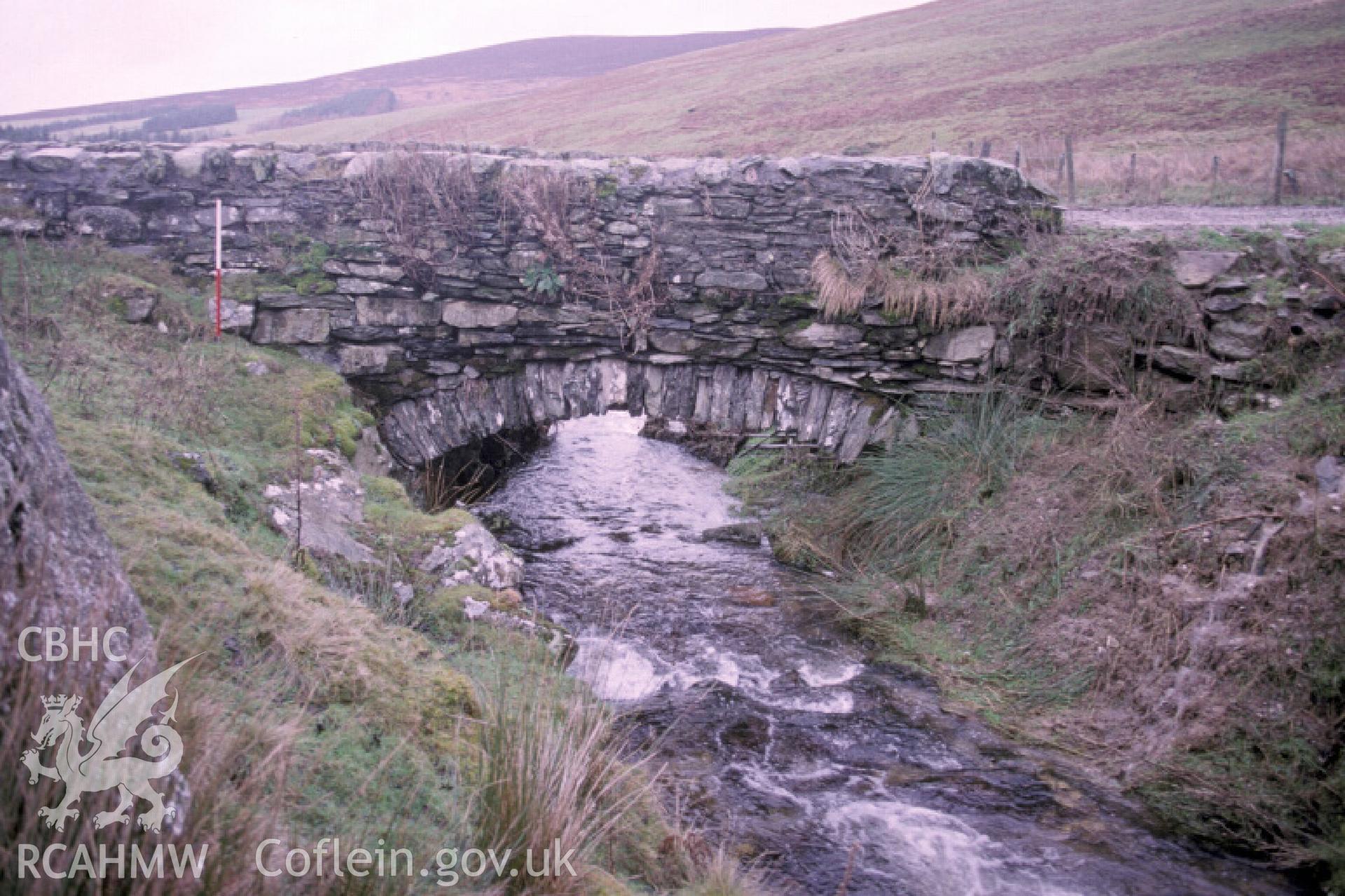 Photograph of Pont Rhyd-y-Hydd from the south. Taken by R. Hankinson on 05/01/2005 during an upland survey undertaken by the Clwyd-Powys Archaeological Trust.