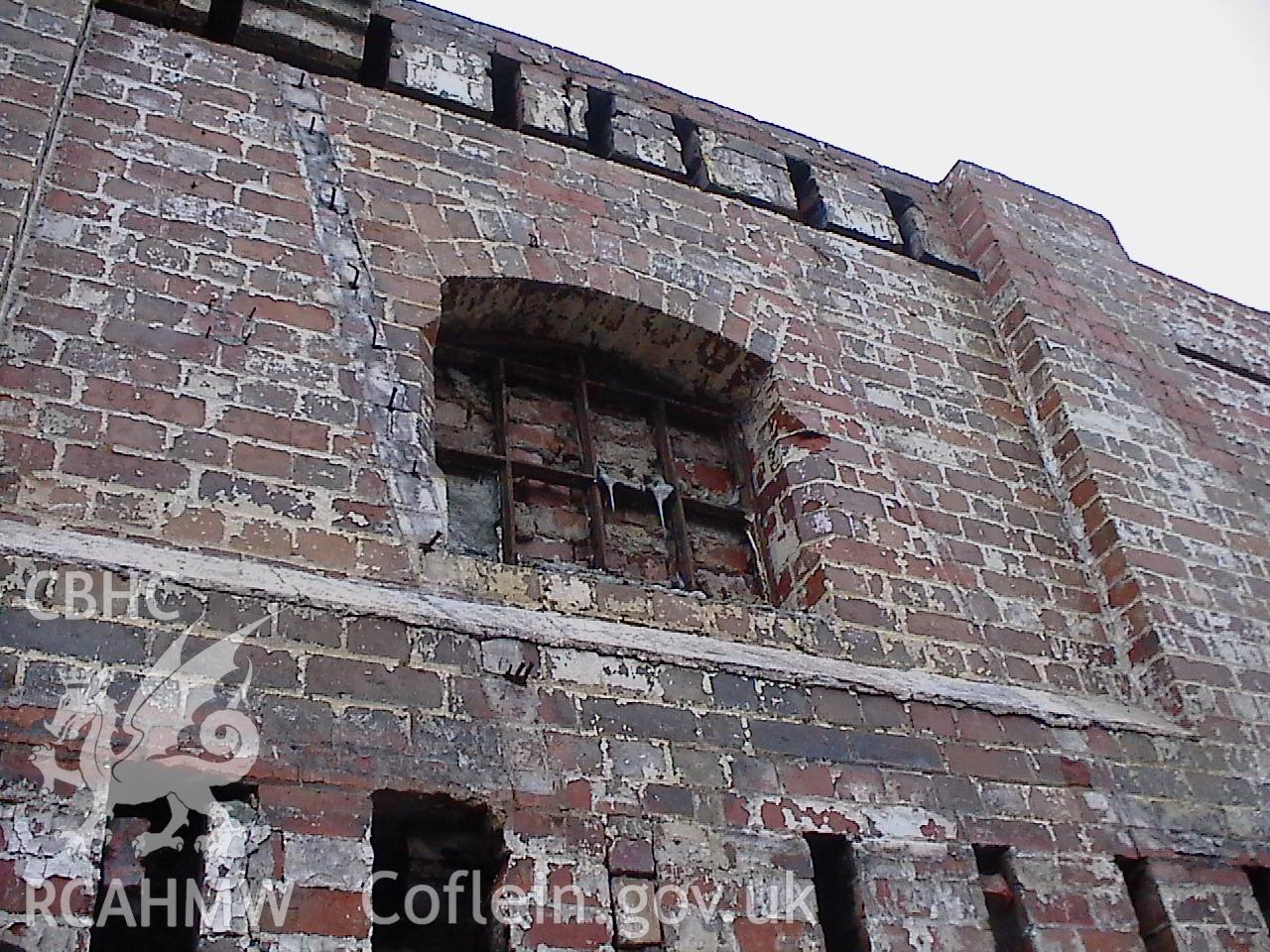 Colour digital photograph showing a brick wall at the Malt House, East Dock Road, Newport. The photograph was taken after the Malt House was severely damaged by fire.