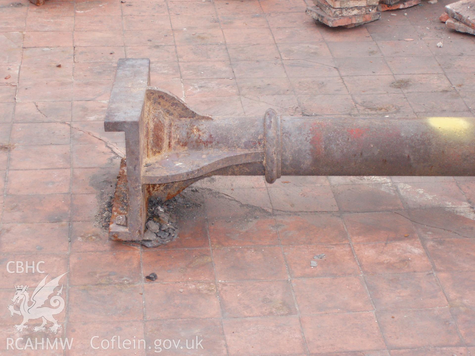 Colour digital photograph detailing a post in the Malt House, East Dock Road, Newport.  The photograph was taken after the Malt House was severely damaged by fire.