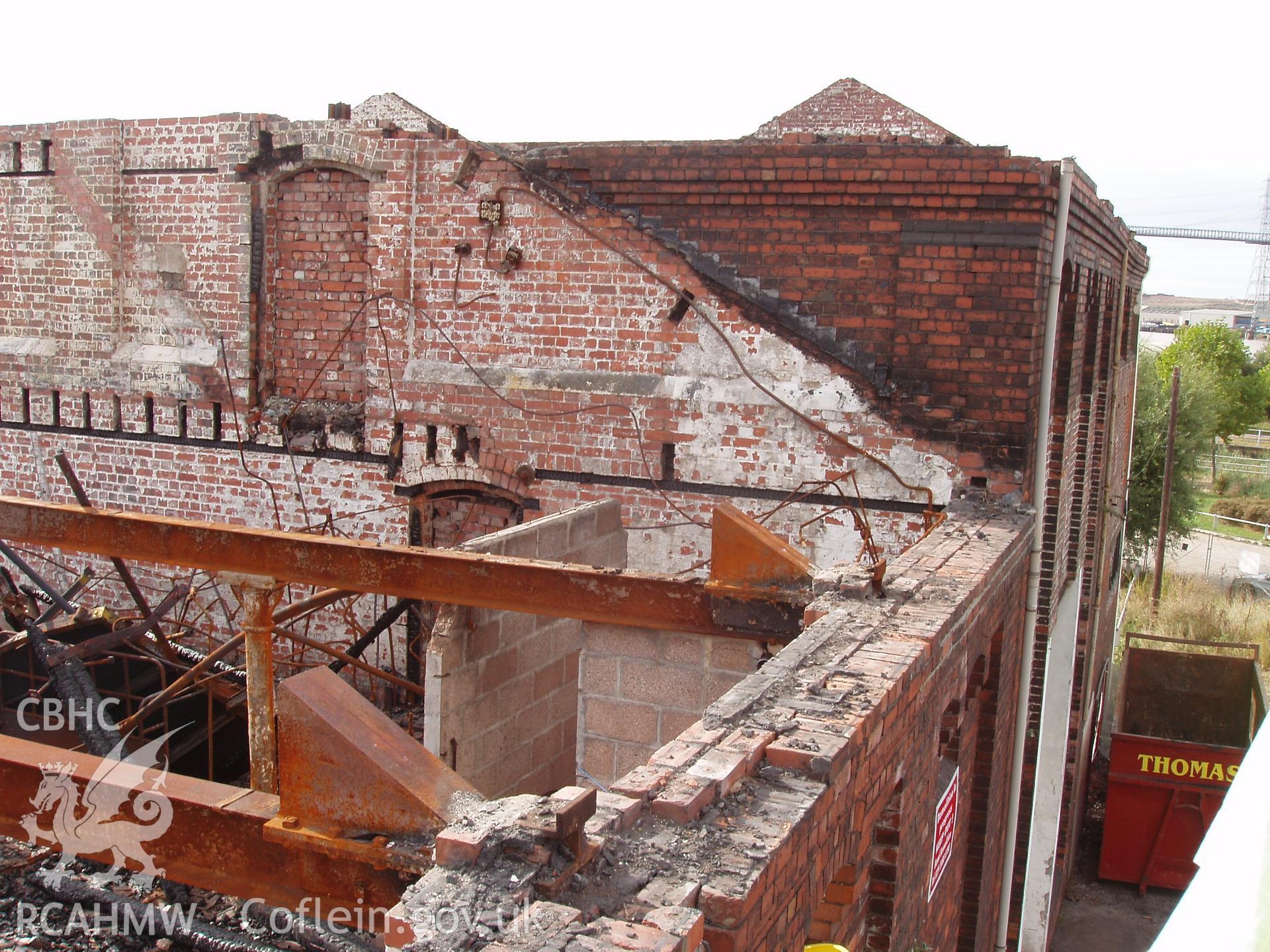 Colour digital photograph showing the remains of the roof at the Malt House, East Dock Road, Newport. The photograph was taken after the building was severely damaged by fire.