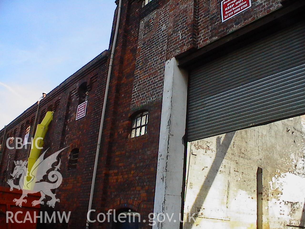 Colour digital photograph showing part of the exterior of the Malt House, East Dock Road, Newport.  The photograph was taken after the Malt House was severely damaged by fire.