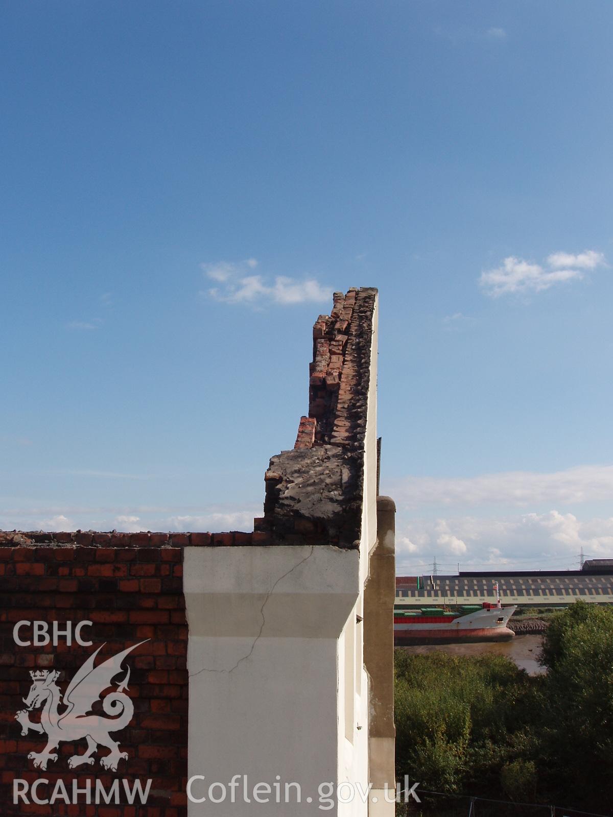 Colour digital photograph showing part of the remains of the roof at the Malt House, East Dock Road, Newport. The photograph was taken after the building was severely damaged by fire.