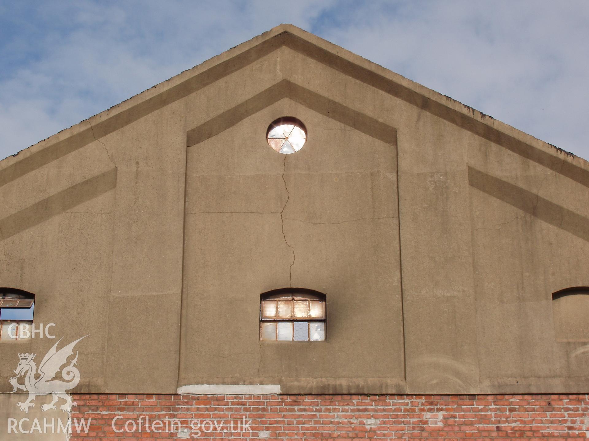 Colour digital photograph showing part of an exterior wall of the Malt House, East Dock Road, Newport.  The photograph was taken after the Malt House was severely damaged by fire.