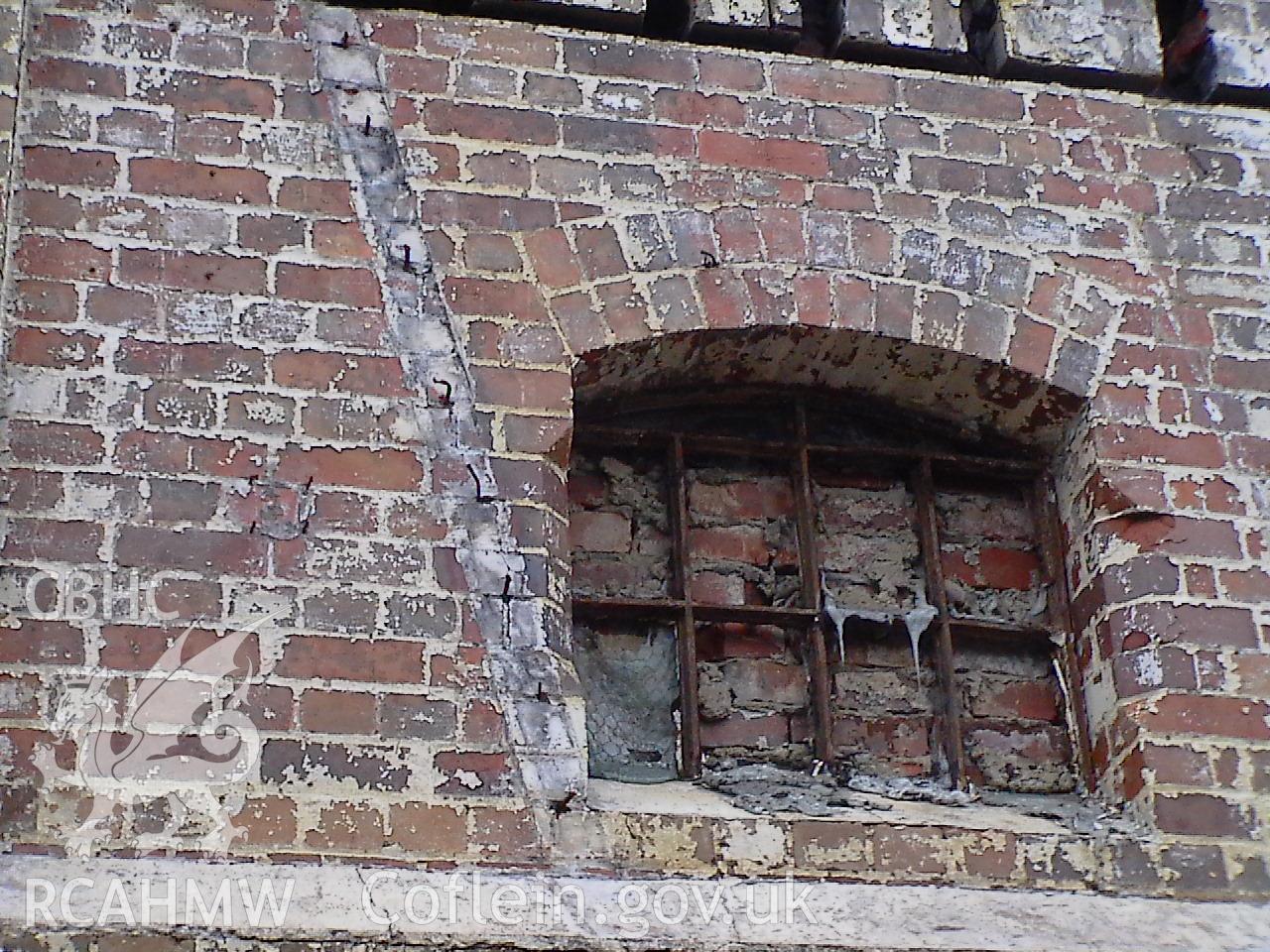 Colour digital photograph showing a brick wall at the Malt House, East Dock Road, Newport. The photograph was taken after the Malt House was severely damaged by fire.