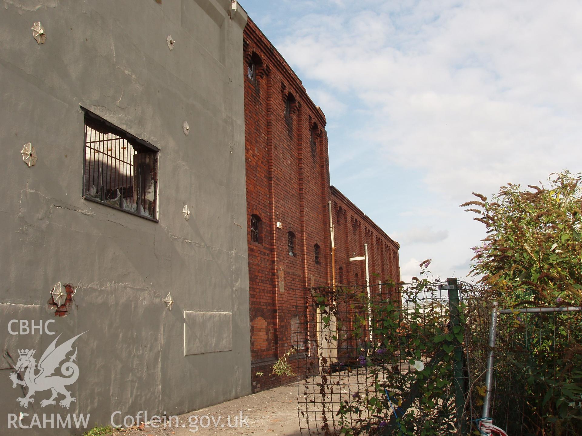 Colour digital photograph showing part of an exterior wall of the Malt House, East Dock Road, Newport.  The photograph was taken after the Malt House was severely damaged by fire.