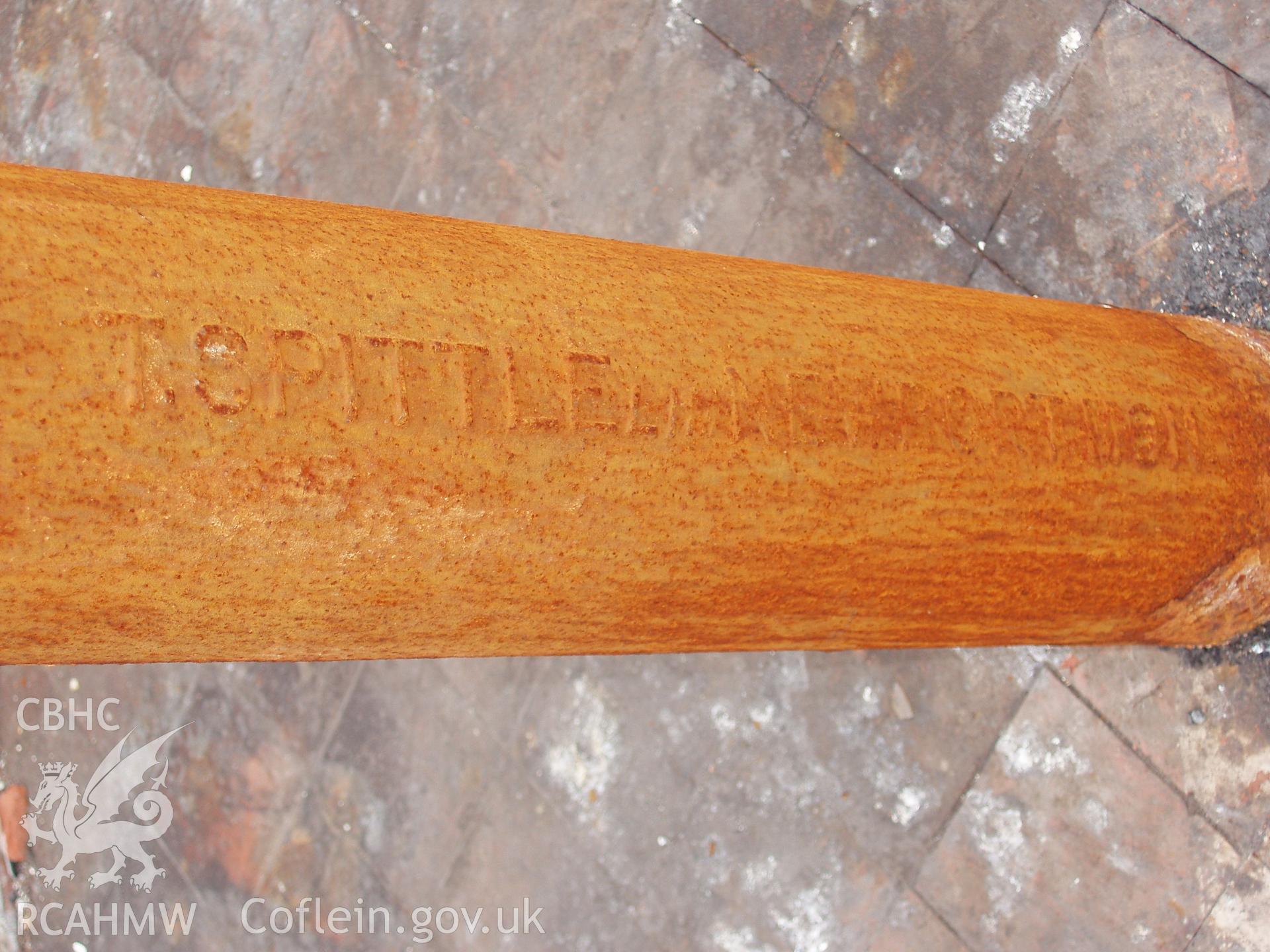 Colour digital photograph detailing a post in the Malt House, East Dock Road, Newport.  The photograph was taken after the Malt House was severely damaged by fire.