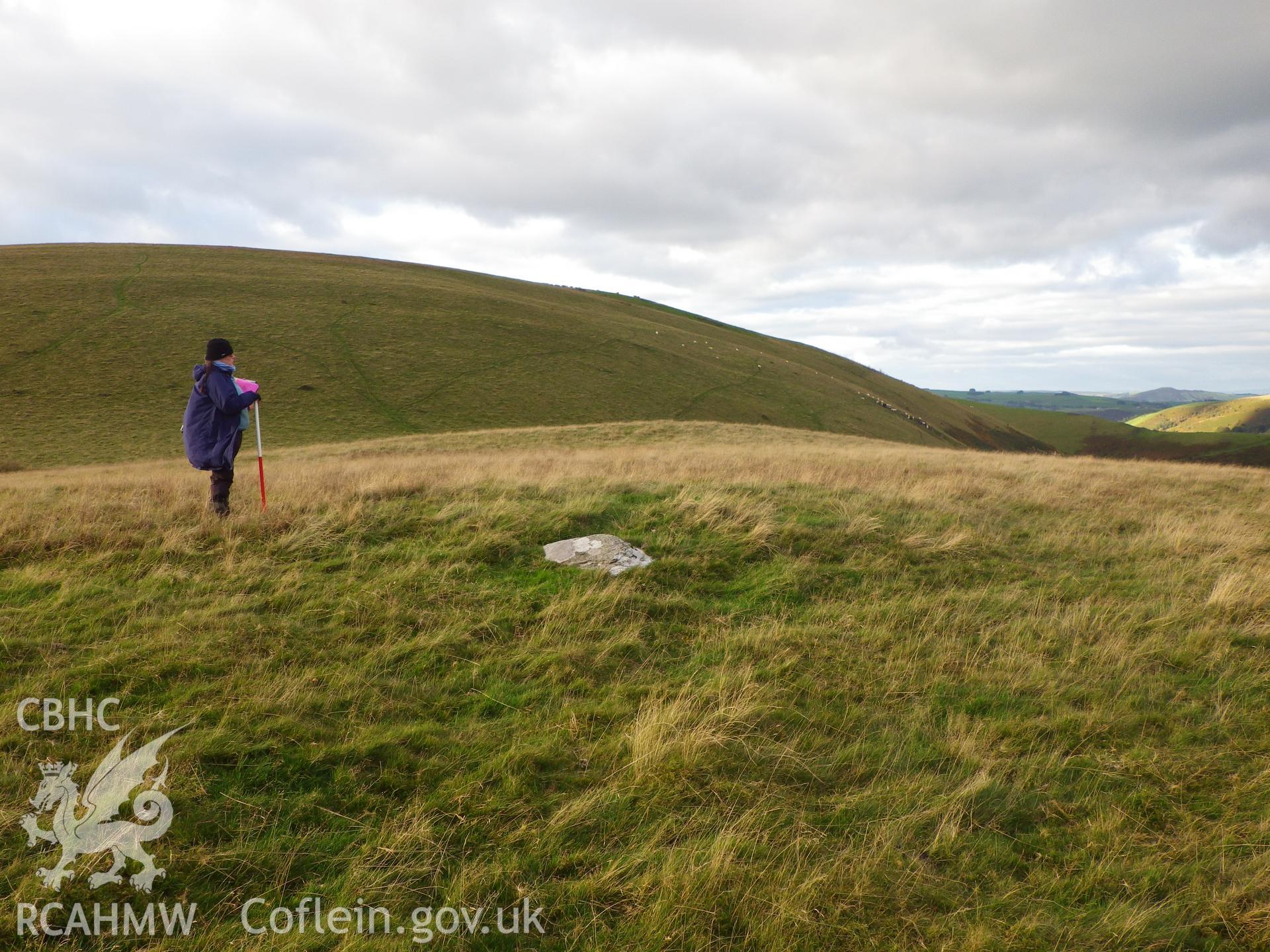 Low, grassed-over cairn, looking north.