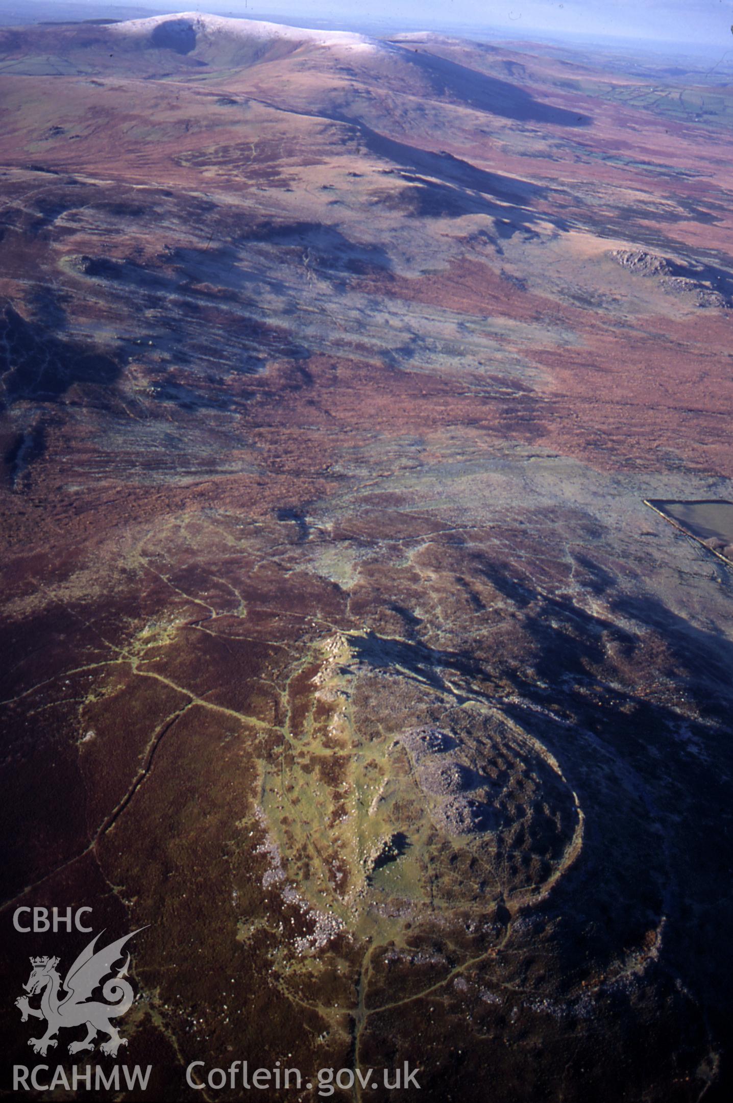 Slide of RCAHMW colour oblique aerial photograph of Foel Drygarn Camp, taken by T.G. Driver, 19/12/1999.