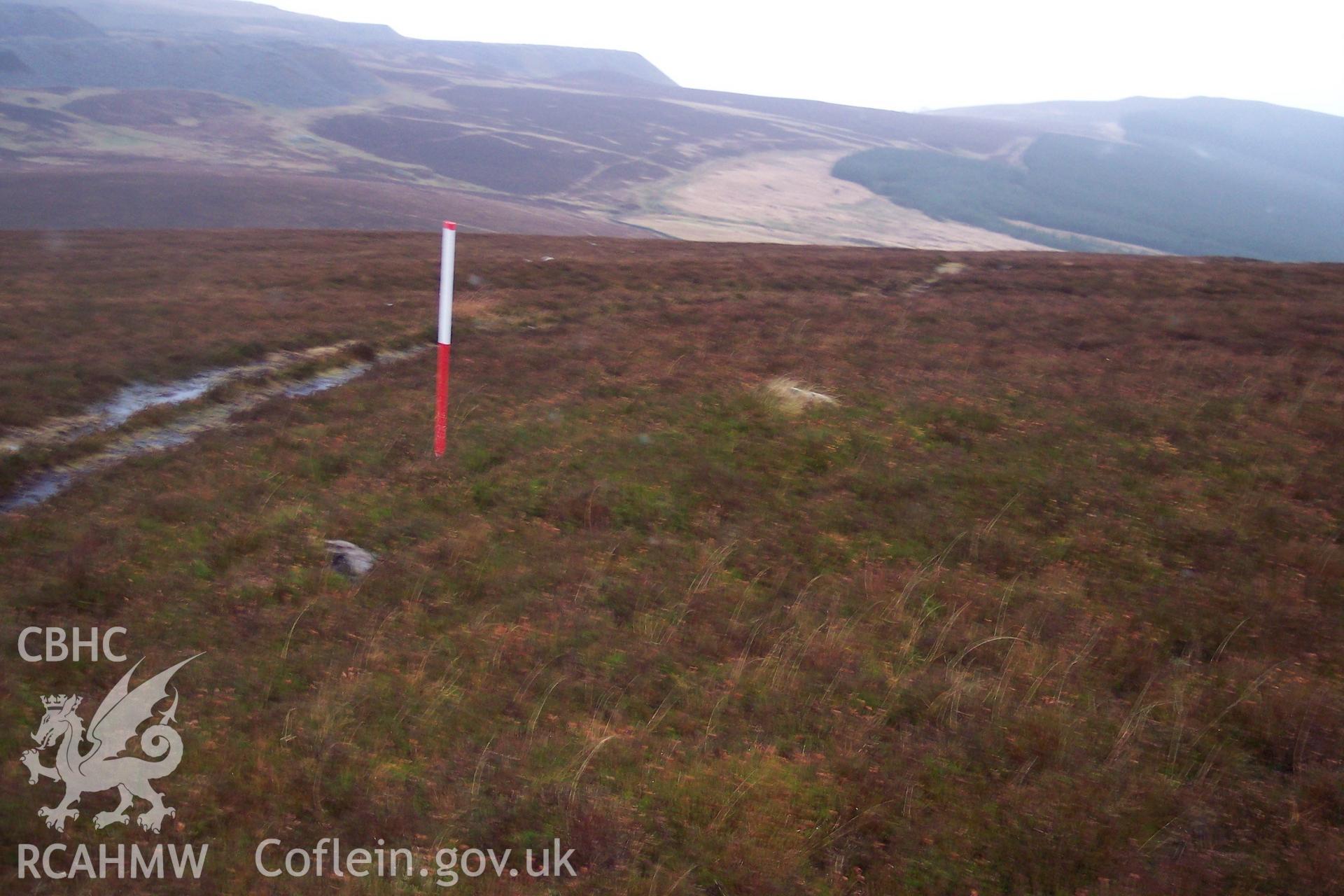 Photograph of Cairn west of Cwm Du taken on 22/12/2005 by P.J. Schofield during an Upland Survey undertaken by Oxford Archaeology North.