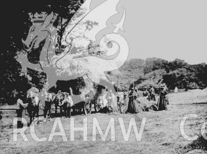 Digital copy of a black and white photograph showing haymakers at work at the Penllergare Estate.