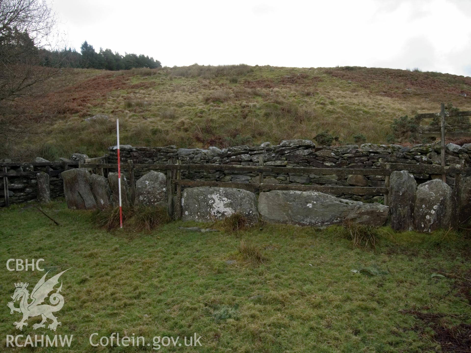 view loking S of line of upright slabs used to sudivide the interior.