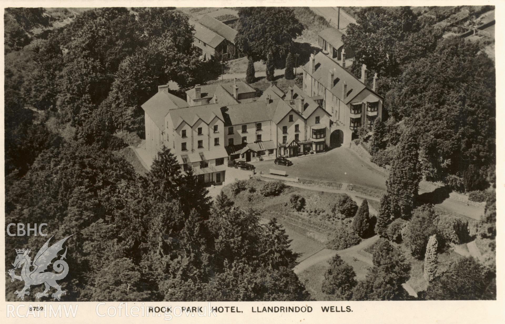 Digitised postcard image of Rock Park Hotel, Llandrindod Wells, Aero Pictorial Ltd. Produced by Parks and Gardens Data Services, from an original item in the Peter Davis Collection at Parks and Gardens UK. We hold only web-resolution images of this collection, suitable for viewing on screen and for research purposes only. We do not hold the original images, or publication quality scans.