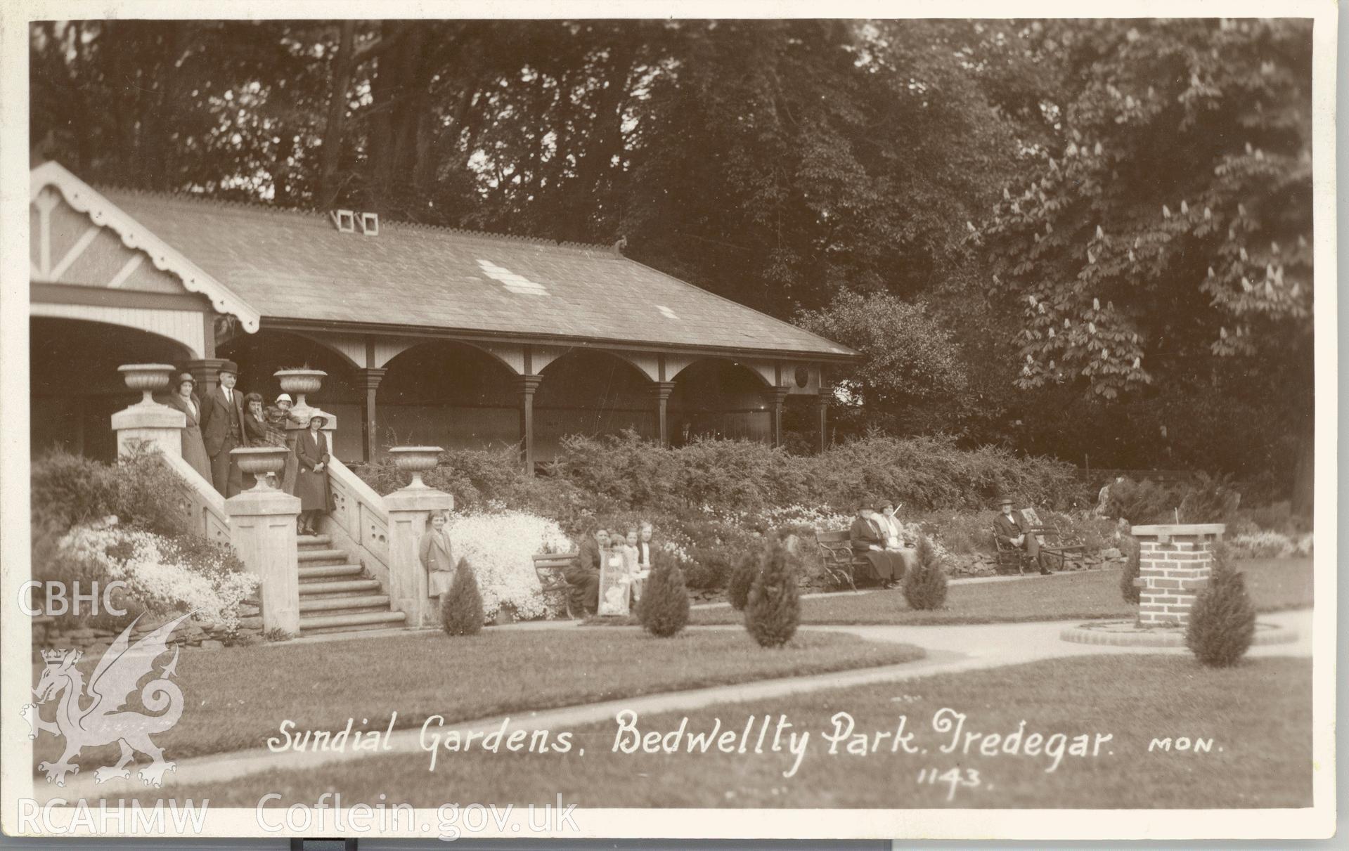 Digitised postcard image of Sundial Gardens, Bedwellty Park, Tredegar. Produced by Parks and Gardens Data Services, from an original item in the Peter Davis Collection at Parks and Gardens UK. We hold only web-resolution images of this collection, suitable for viewing on screen and for research purposes only. We do not hold the original images, or publication quality scans.