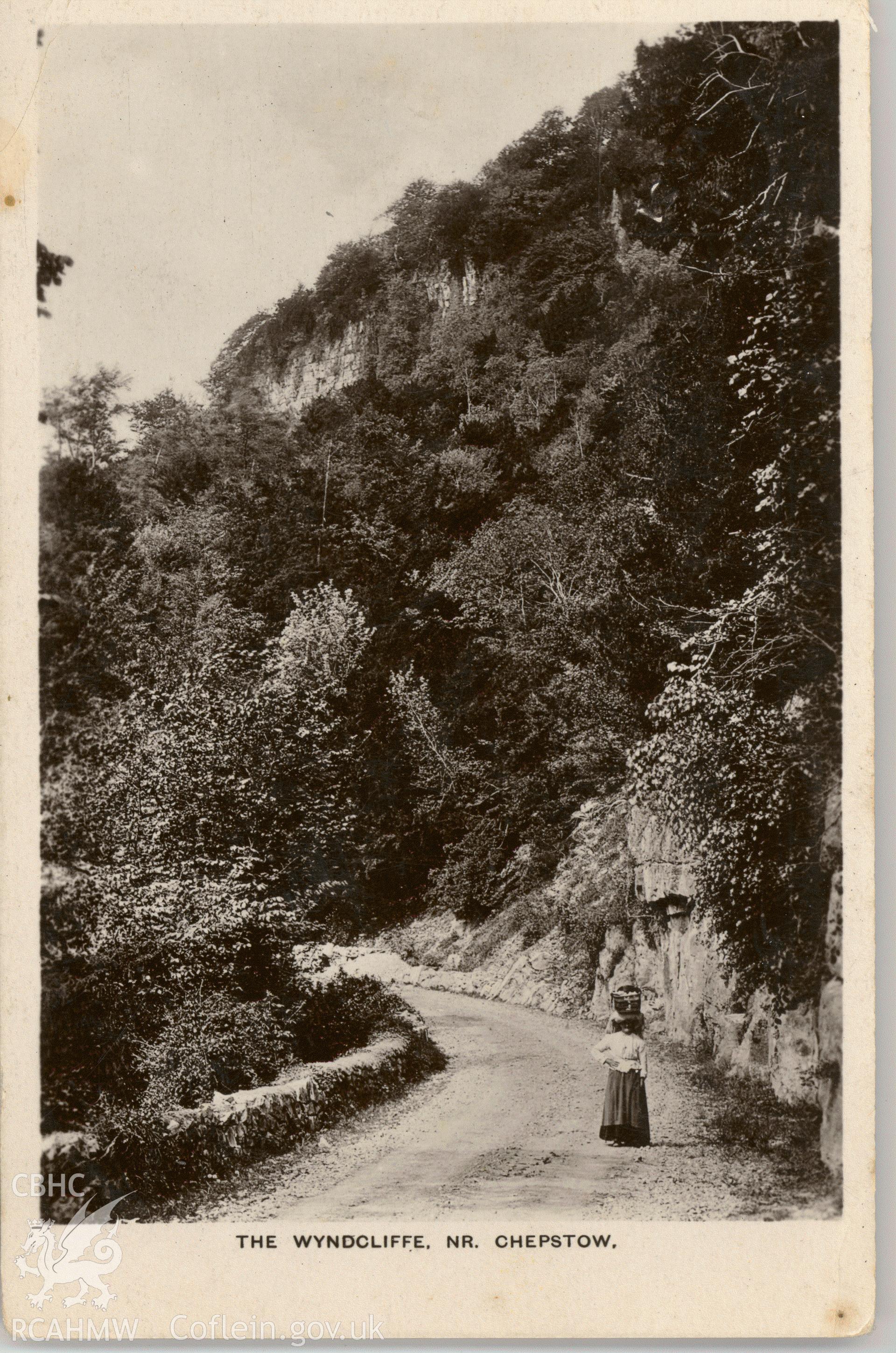 Digitised postcard image of figure walking under the Wyndcliff near Moss Cottage, Wyndcliffe, W. G. Bennett, Abbey Road, Tintern. Produced by Parks and Gardens Data Services, from an original item in the Peter Davis Collection at Parks and Gardens UK. We hold only web-resolution images of this collection, suitable for viewing on screen and for research purposes only. We do not hold the original images, or publication quality scans.