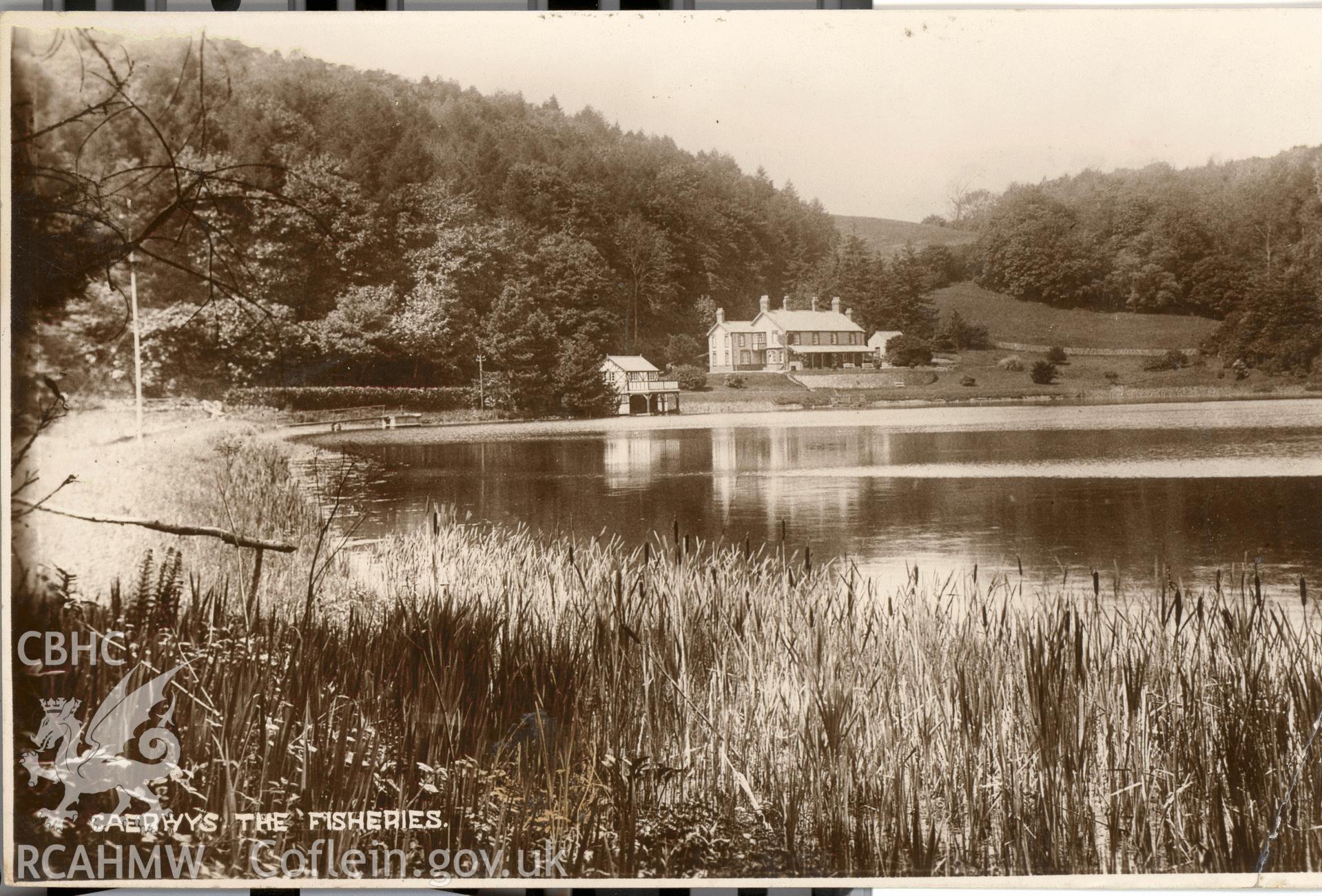 Digitised postcard image of Club House, Ysceifiog Lake (Fisheries), W.R. Jones, Compton house, Caerwys. Produced by Parks and Gardens Data Services, from an original item in the Peter Davis Collection at Parks and Gardens UK. We hold only web-resolution images of this collection, suitable for viewing on screen and for research purposes only. We do not hold the original images, or publication quality scans.