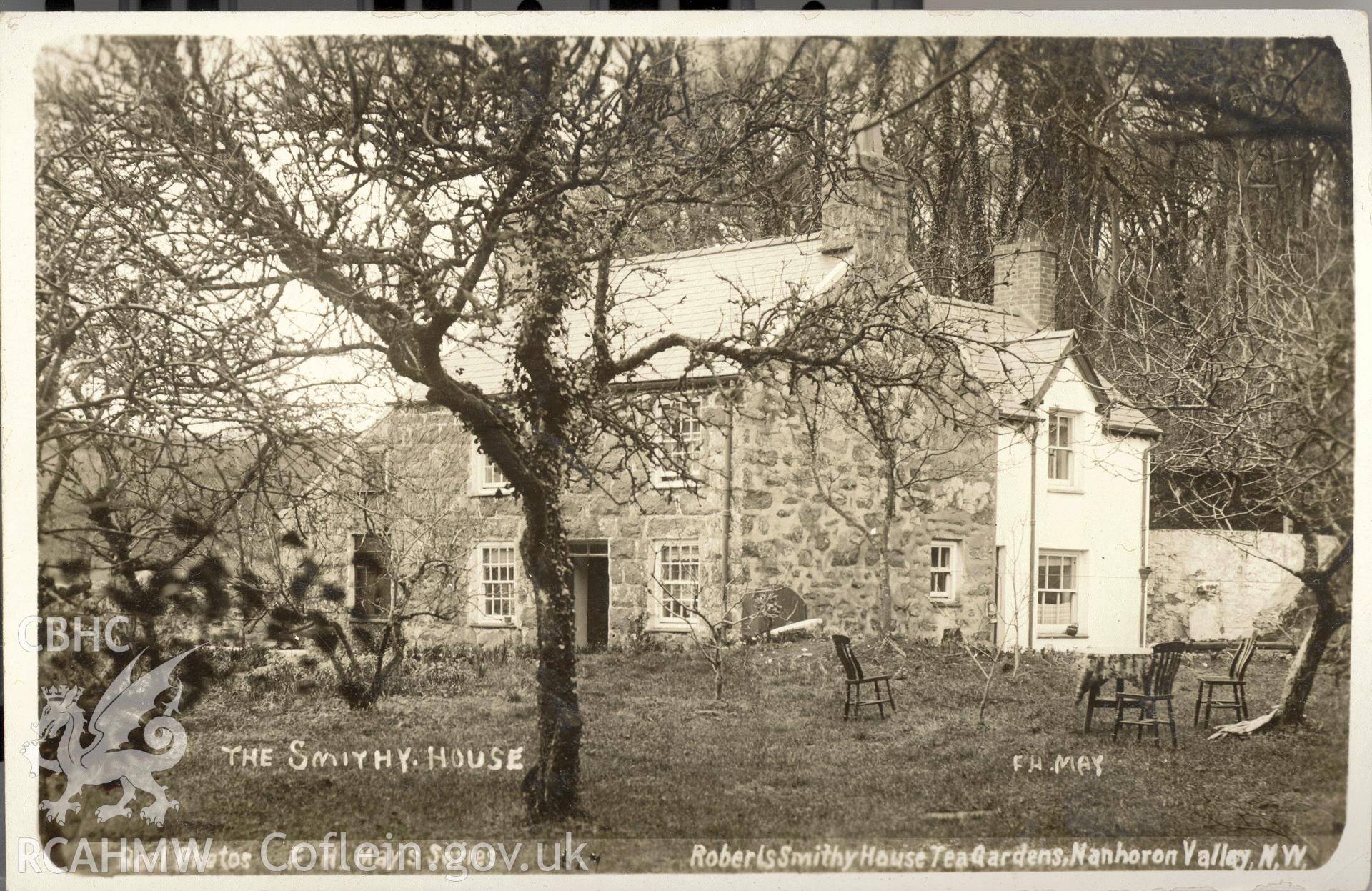 Digitised postcard image of Rhyd-galed Smithy, Nanhoron, FH May. Produced by Parks and Gardens Data Services, from an original item in the Peter Davis Collection at Parks and Gardens UK. We hold only web-resolution images of this collection, suitable for viewing on screen and for research purposes only. We do not hold the original images, or publication quality scans.