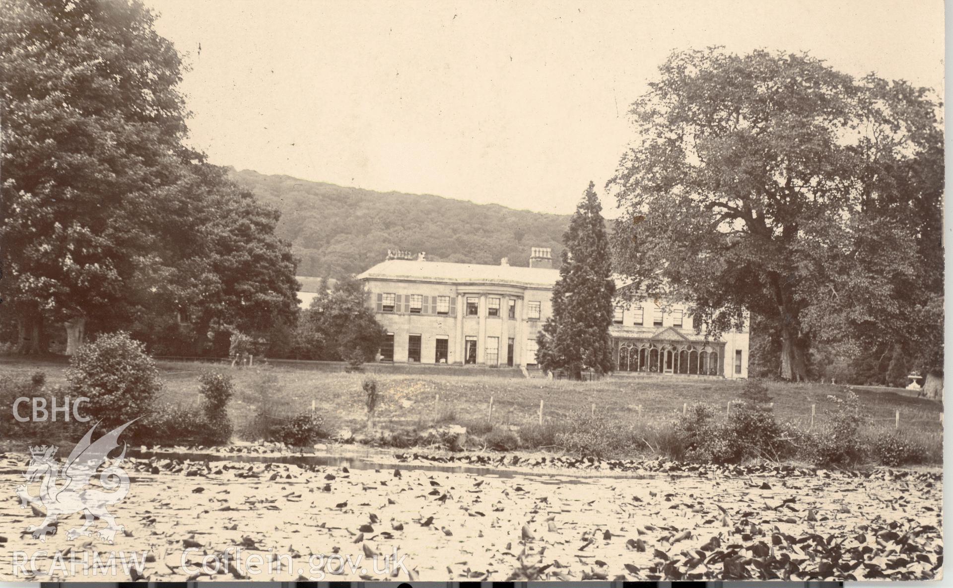 Digitised postcard image of R?g Hall, Corwen. Produced by Parks and Gardens Data Services, from an original item in the Peter Davis Collection at Parks and Gardens UK. We hold only web-resolution images of this collection, suitable for viewing on screen and for research purposes only. We do not hold the original images, or publication quality scans.