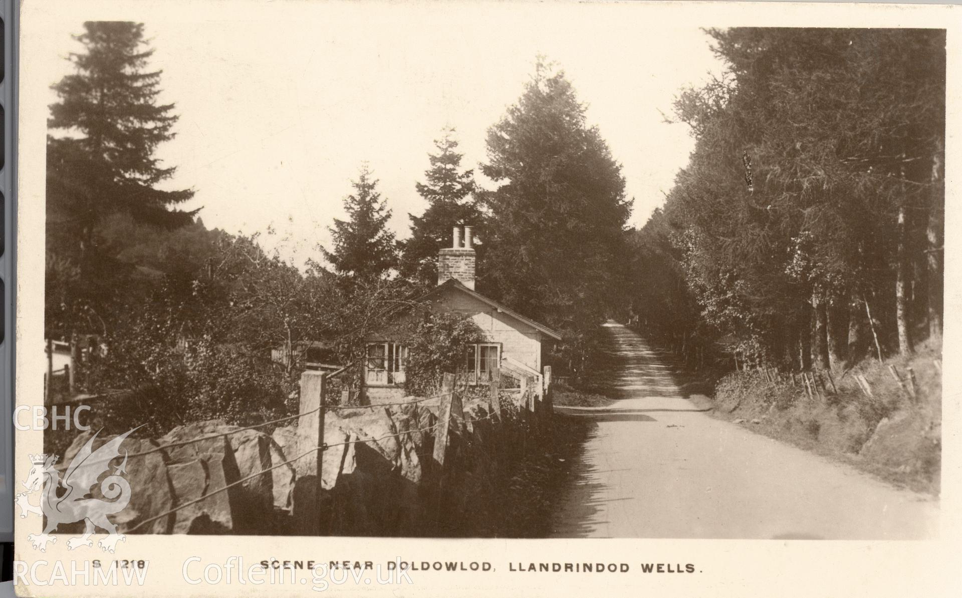 Digitised postcard image of Scene near Doldowlod, Llandrindod Wells, Kingsway Real Photo series. Produced by Parks and Gardens Data Services, from an original item in the Peter Davis Collection at Parks and Gardens UK. We hold only web-resolution images of this collection, suitable for viewing on screen and for research purposes only. We do not hold the original images, or publication quality scans.