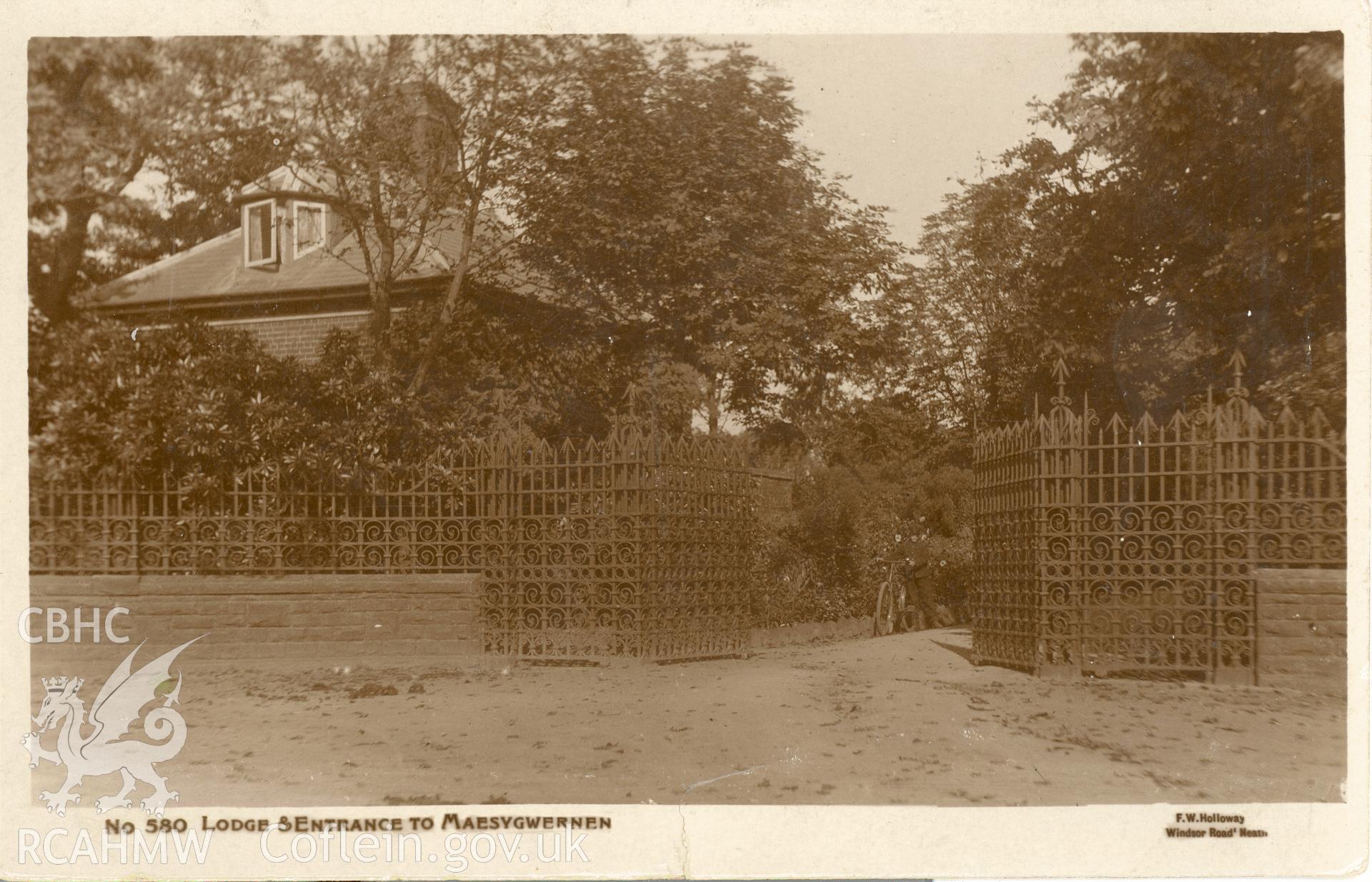 Digitised postcard image of lodge and gates to Maesygwernen Hall, F.W. Holloway, Windsor Road, Neath. Produced by Parks and Gardens Data Services, from an original item in the Peter Davis Collection at Parks and Gardens UK. We hold only web-resolution images of this collection, suitable for viewing on screen and for research purposes only. We do not hold the original images, or publication quality scans.