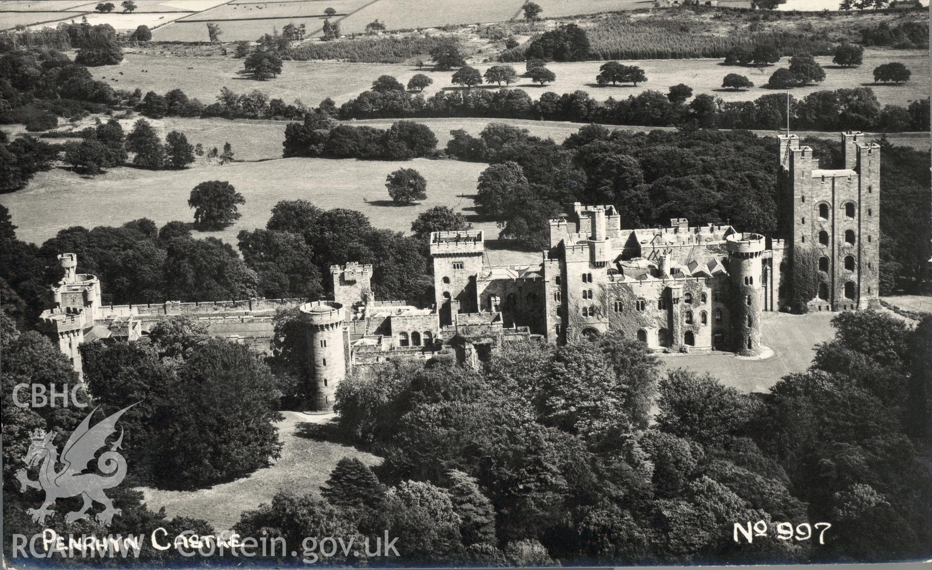 Digitised postcard image of aerial photo of Penrhyn Castle, Bangor, Photair Ltd., Barton Airport, Manchester. Produced by Parks and Gardens Data Services, from an original item in the Peter Davis Collection at Parks and Gardens UK. We hold only web-resolution images of this collection, suitable for viewing on screen and for research purposes only. We do not hold the original images, or publication quality scans.