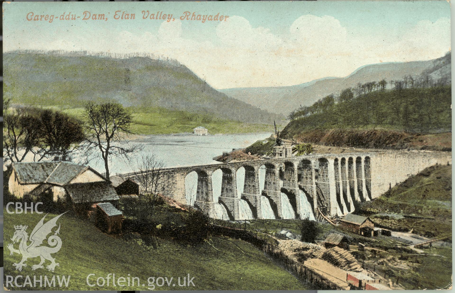 Digitised postcard image of Carreg Ddu Dam, Elan valley, Rhayader, J. Roberts, Chemist, Rhayader. Produced by Parks and Gardens Data Services, from an original item in the Peter Davis Collection at Parks and Gardens UK. We hold only web-resolution images of this collection, suitable for viewing on screen and for research purposes only. We do not hold the original images, or publication quality scans.