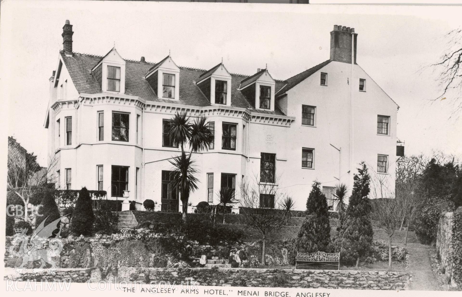 Digitised postcard image of Anglesey Arms Hotel, Menai Bridge, Raphael Tuck and Sons Ltd. Produced by Parks and Gardens Data Services, from an original item in the Peter Davis Collection at Parks and Gardens UK. We hold only web-resolution images of this collection, suitable for viewing on screen and for research purposes only. We do not hold the original images, or publication quality scans.