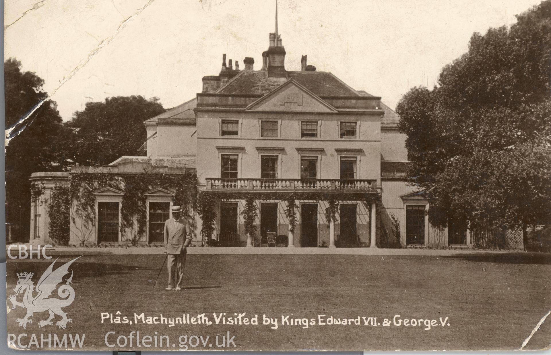 Digitised postcard image of the Plas, Machynlleth, with figure. Produced by Parks and Gardens Data Services, from an original item in the Peter Davis Collection at Parks and Gardens UK. We hold only web-resolution images of this collection, suitable for viewing on screen and for research purposes only. We do not hold the original images, or publication quality scans.