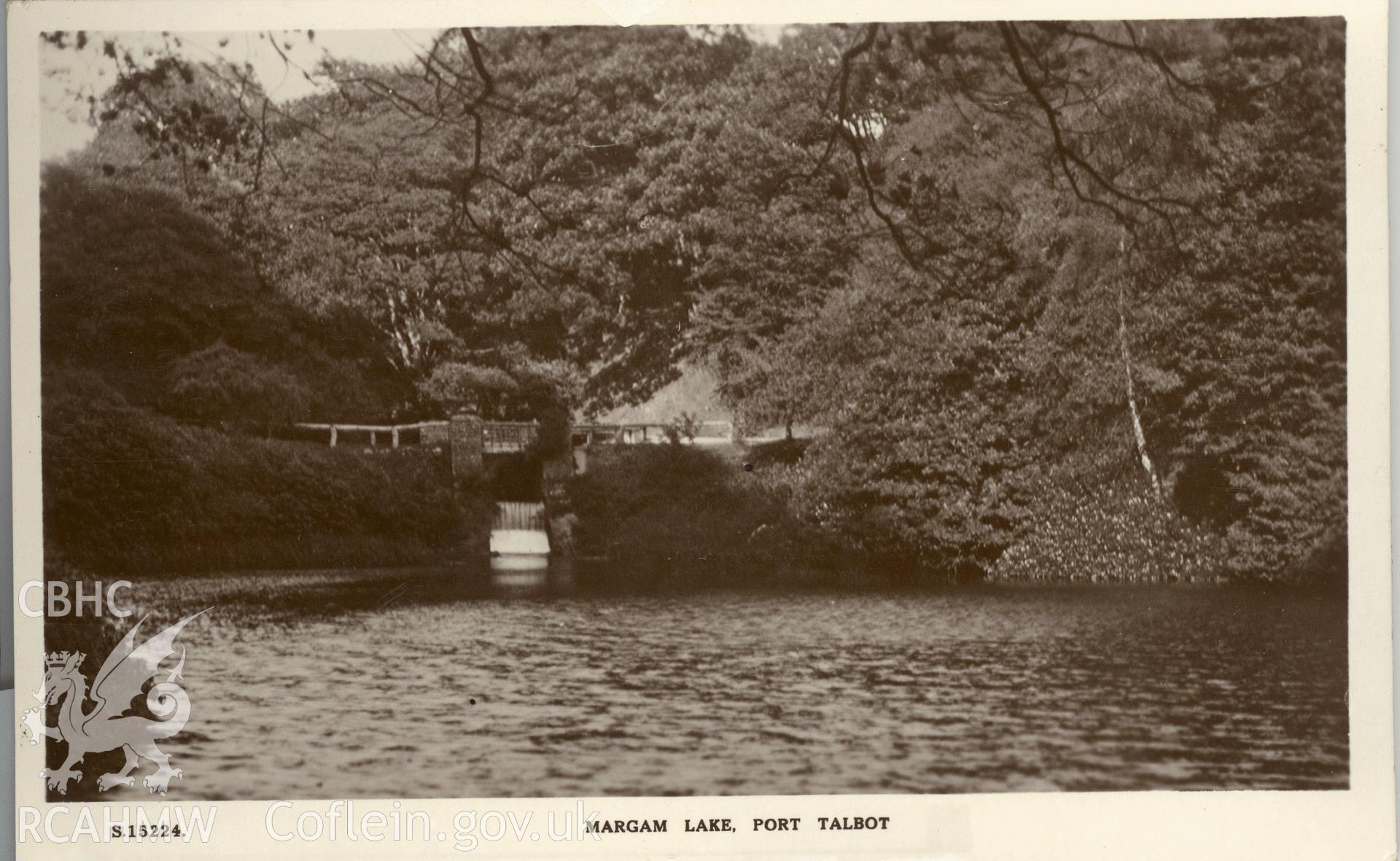 Digitised postcard image of the lake, Margam park gardens, Kingsway Real Photo Series. Produced by Parks and Gardens Data Services, from an original item in the Peter Davis Collection at Parks and Gardens UK. We hold only web-resolution images of this collection, suitable for viewing on screen and for research purposes only. We do not hold the original images, or publication quality scans.
