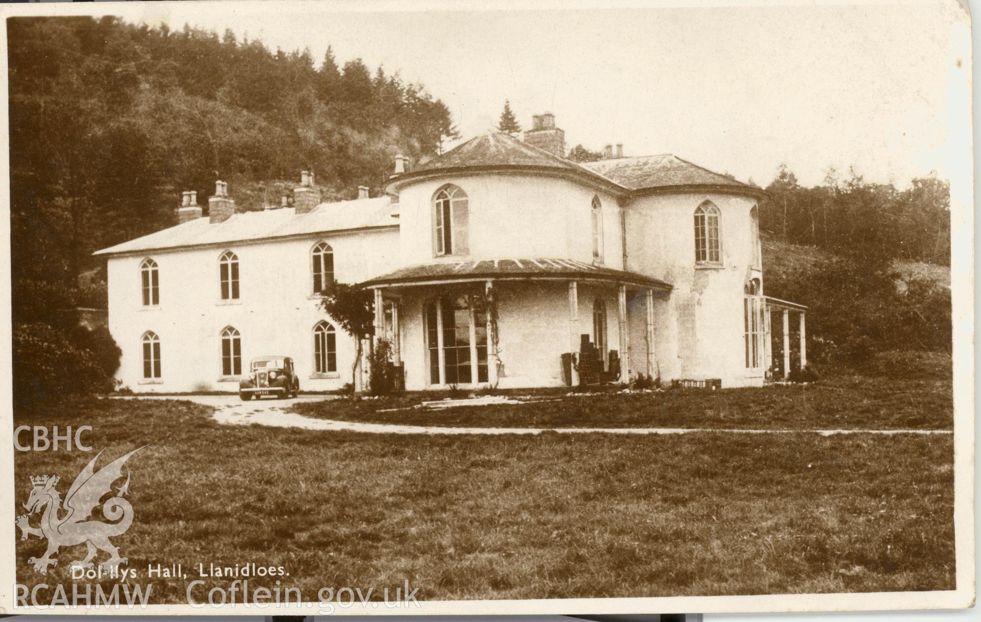 Digitised postcard image of Dollys Hall, Llanidloes. Produced by Parks and Gardens Data Services, from an original item in the Peter Davis Collection at Parks and Gardens UK. We hold only web-resolution images of this collection, suitable for viewing on screen and for research purposes only. We do not hold the original images, or publication quality scans.