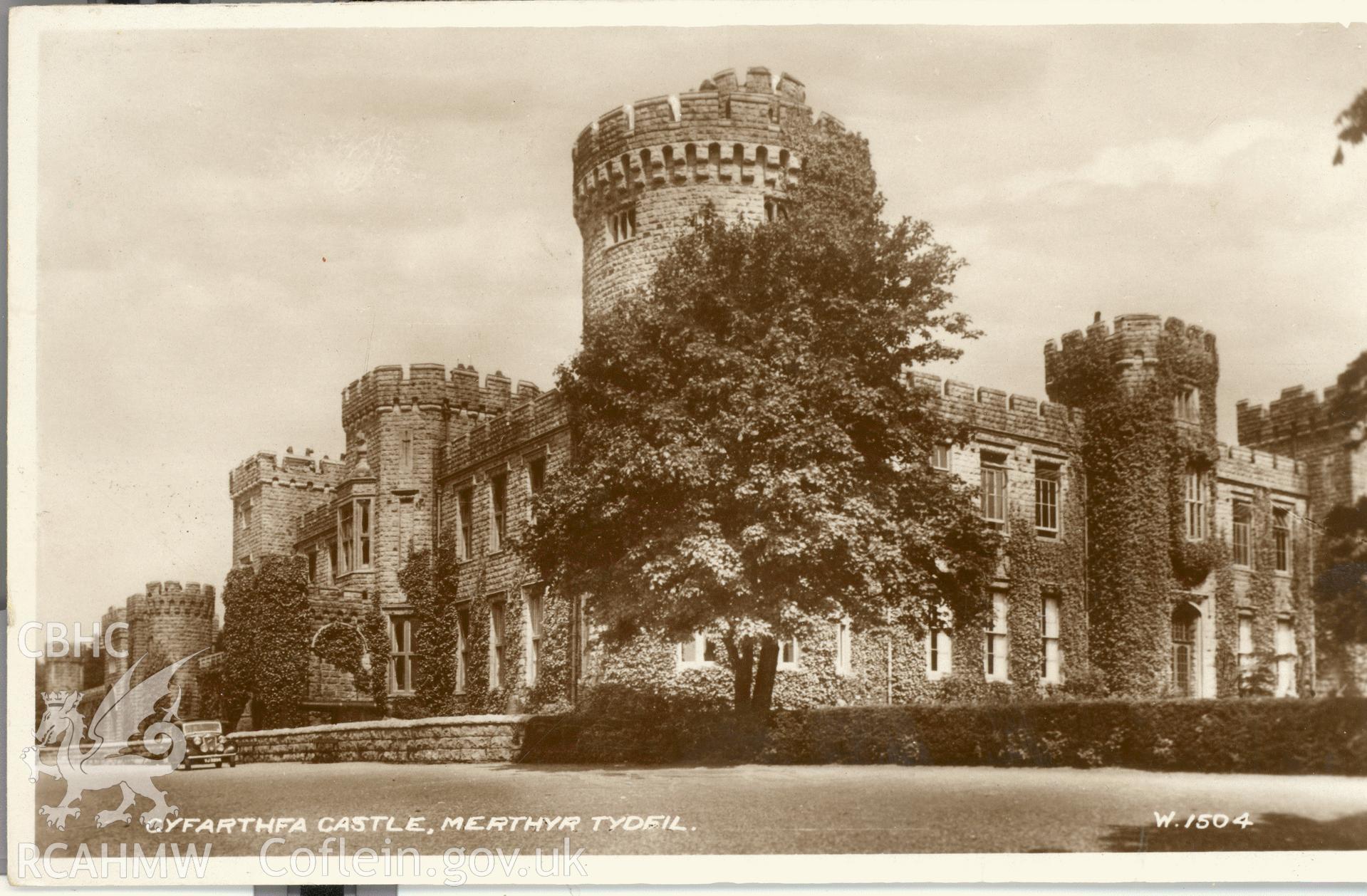 Digitised postcard image of Cyfarthfa Castle, Merthyr Tydfil, and car, Valentine and Sons Ltd. Produced by Parks and Gardens Data Services, from an original item in the Peter Davis Collection at Parks and Gardens UK. We hold only web-resolution images of this collection, suitable for viewing on screen and for research purposes only. We do not hold the original images, or publication quality scans.