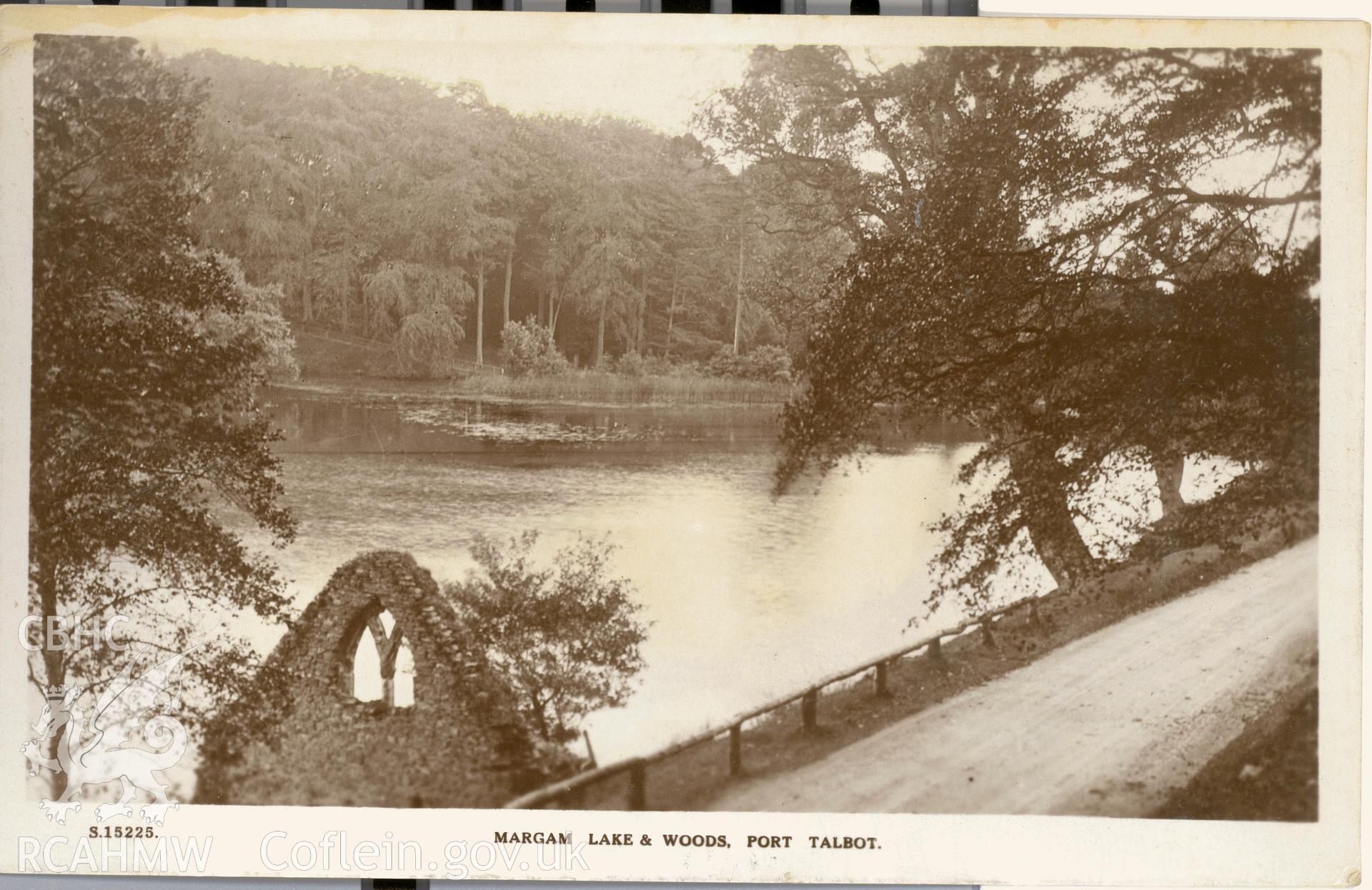 Digitised postcard image of the lake, Margam park gardens, Kingsway Real Photo Series. Produced by Parks and Gardens Data Services, from an original item in the Peter Davis Collection at Parks and Gardens UK. We hold only web-resolution images of this collection, suitable for viewing on screen and for research purposes only. We do not hold the original images, or publication quality scans.
