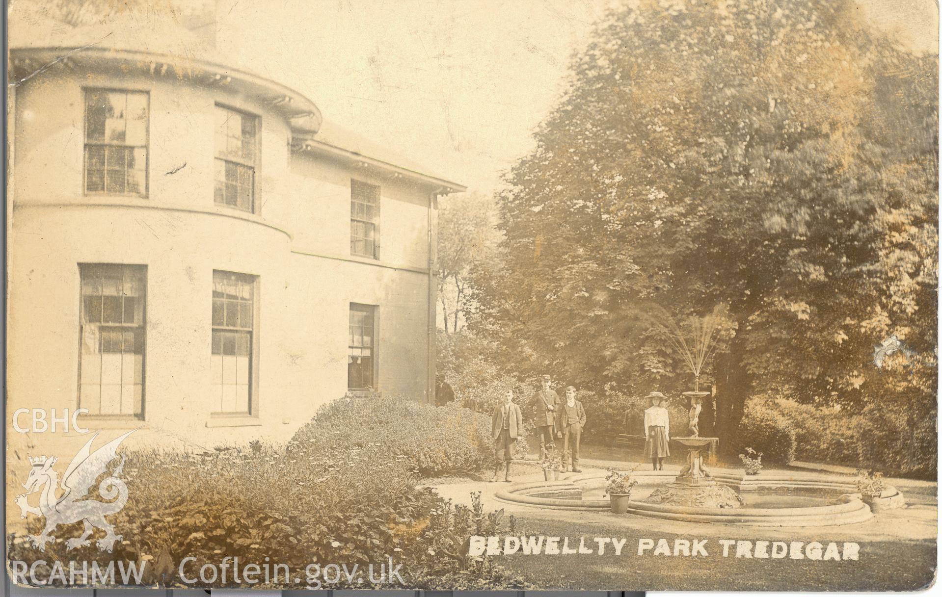 Digitised postcard image of Bedwellty House, Tredegar, including figures, Eastment & Son Artists, Ebbw Vale. Produced by Parks and Gardens Data Services, from an original item in the Peter Davis Collection at Parks and Gardens UK. We hold only web-resolution images of this collection, suitable for viewing on screen and for research purposes only. We do not hold the original images, or publication quality scans.