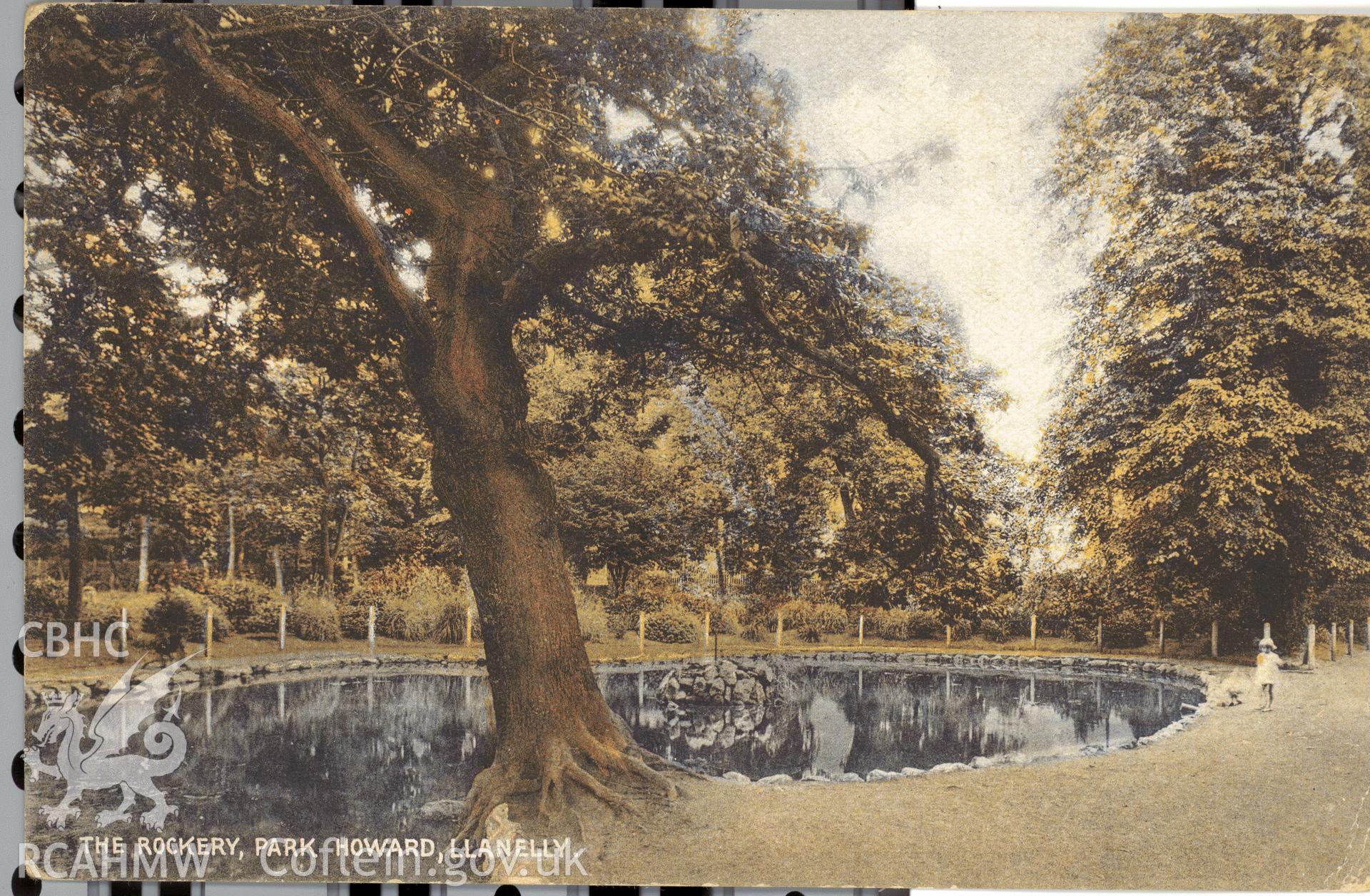 Digitised postcard image of pond and fountain at Parc Howard garden, Llanelli. Produced by Parks and Gardens Data Services, from an original item in the Peter Davis Collection at Parks and Gardens UK. We hold only web-resolution images of this collection, suitable for viewing on screen and for research purposes only. We do not hold the original images, or publication quality scans.