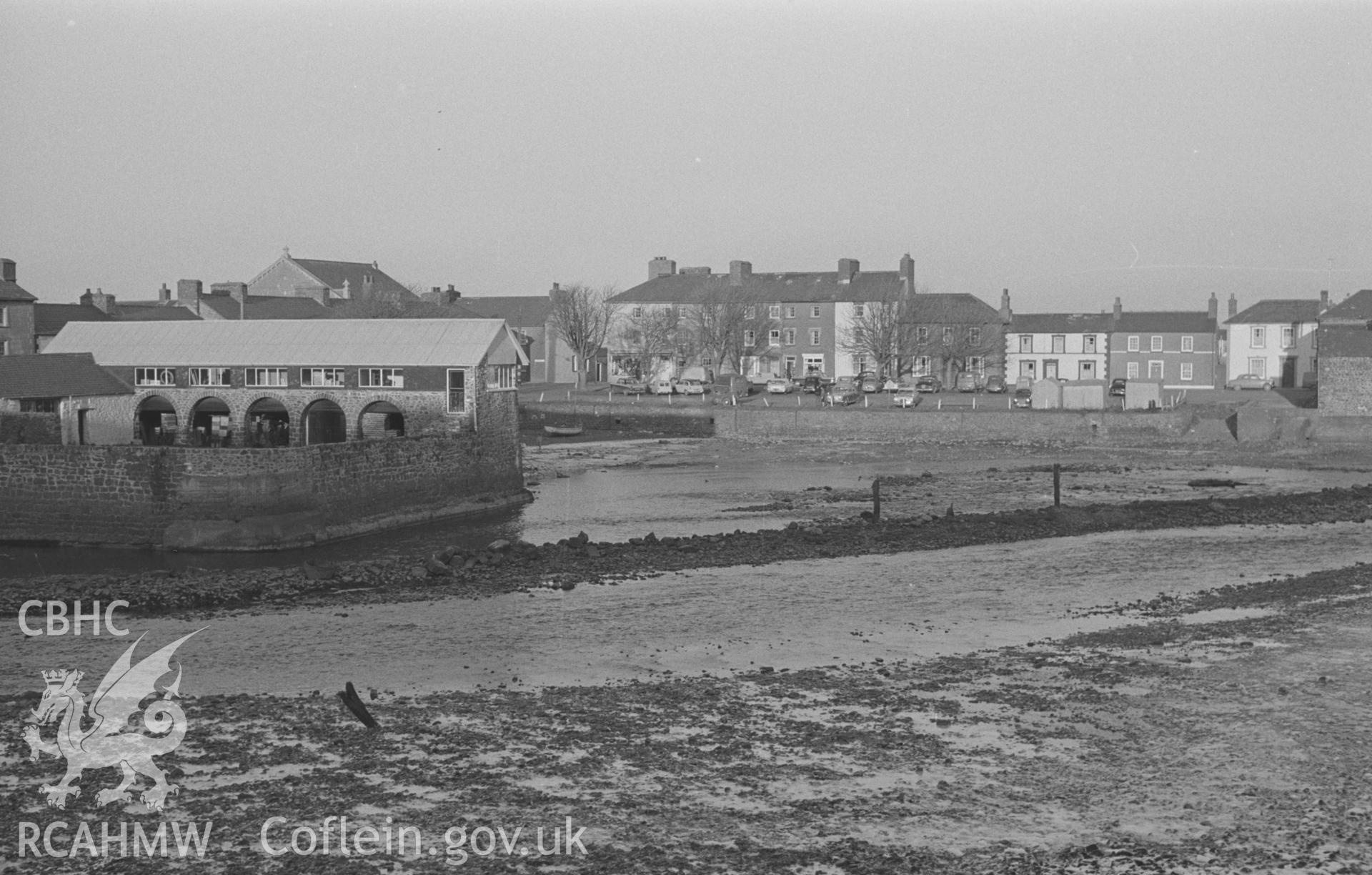 Black and White photograph showing view across the upper part of the harbour at Aberaeron. Photographed by Arthur Chater in December 1962, from Grid Reference SN 4565 6282, looking north east.