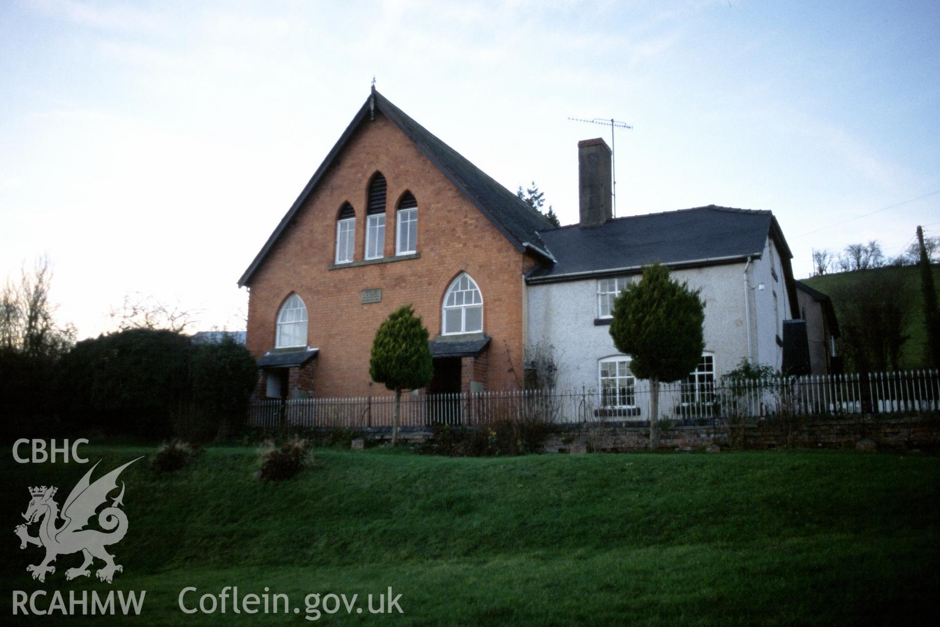 Exterior, SE gable-entry elevation & adjoining house