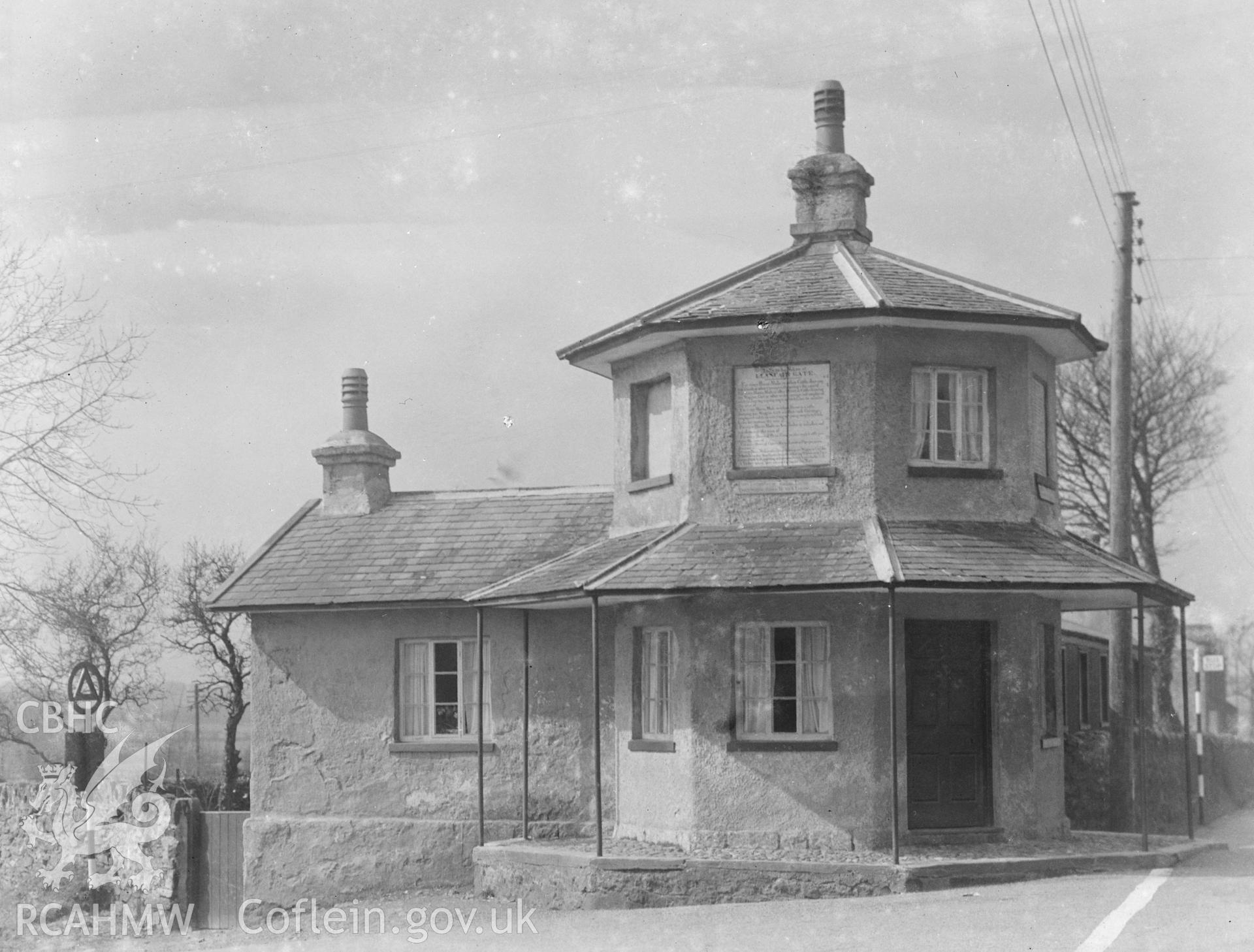 Black and white print of a photograph of Llanfair Gate Toll House, Llanfair P G.