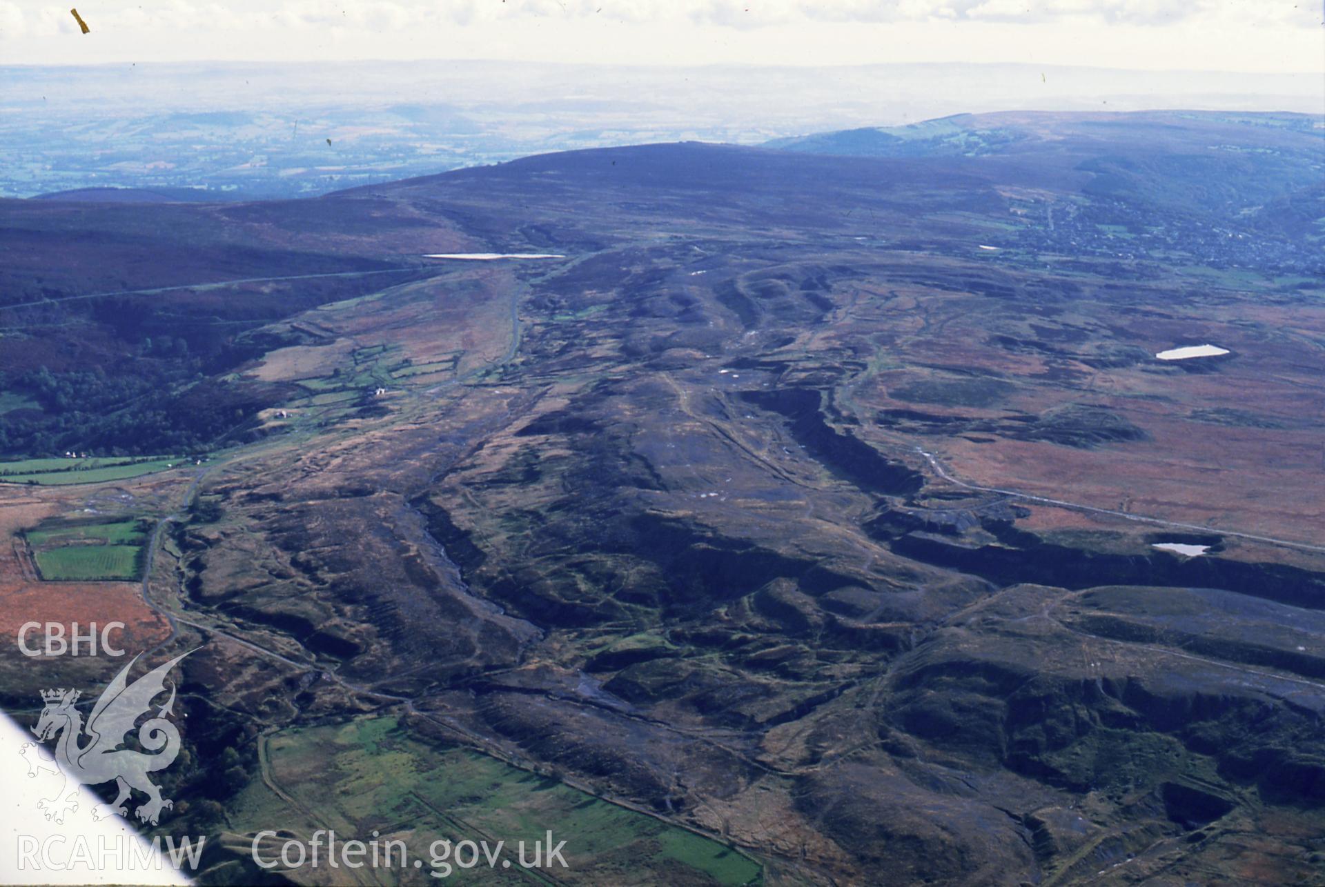 RCAHMW colour slide oblique aerial photograph of the ironstone quarry north of Tir Abraham Harry, Blaenavon, taken on 19/10/1992 by CR Musson