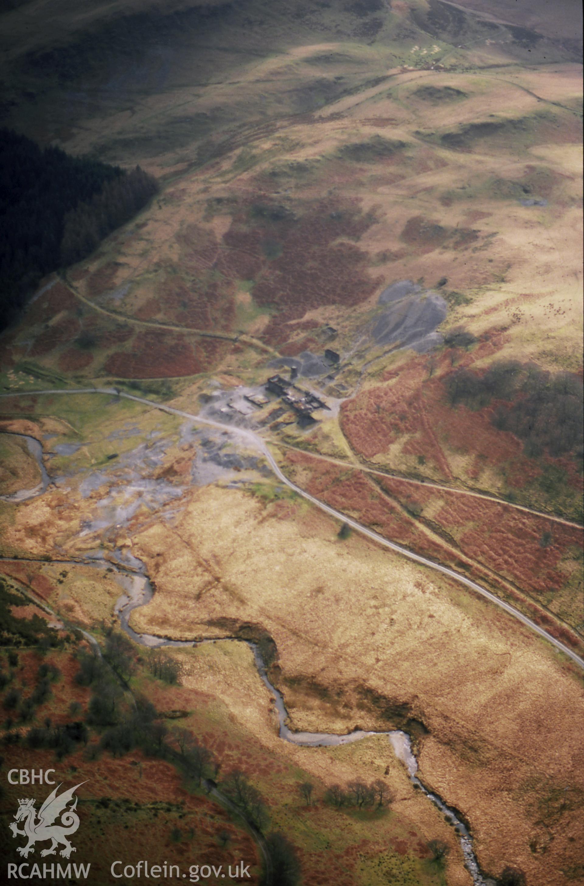 RCAHMW colour slide oblique aerial photograph of Bwlchglas Mine, Ceulanamaesmawr, taken on 19/03/1999 by Toby Driver