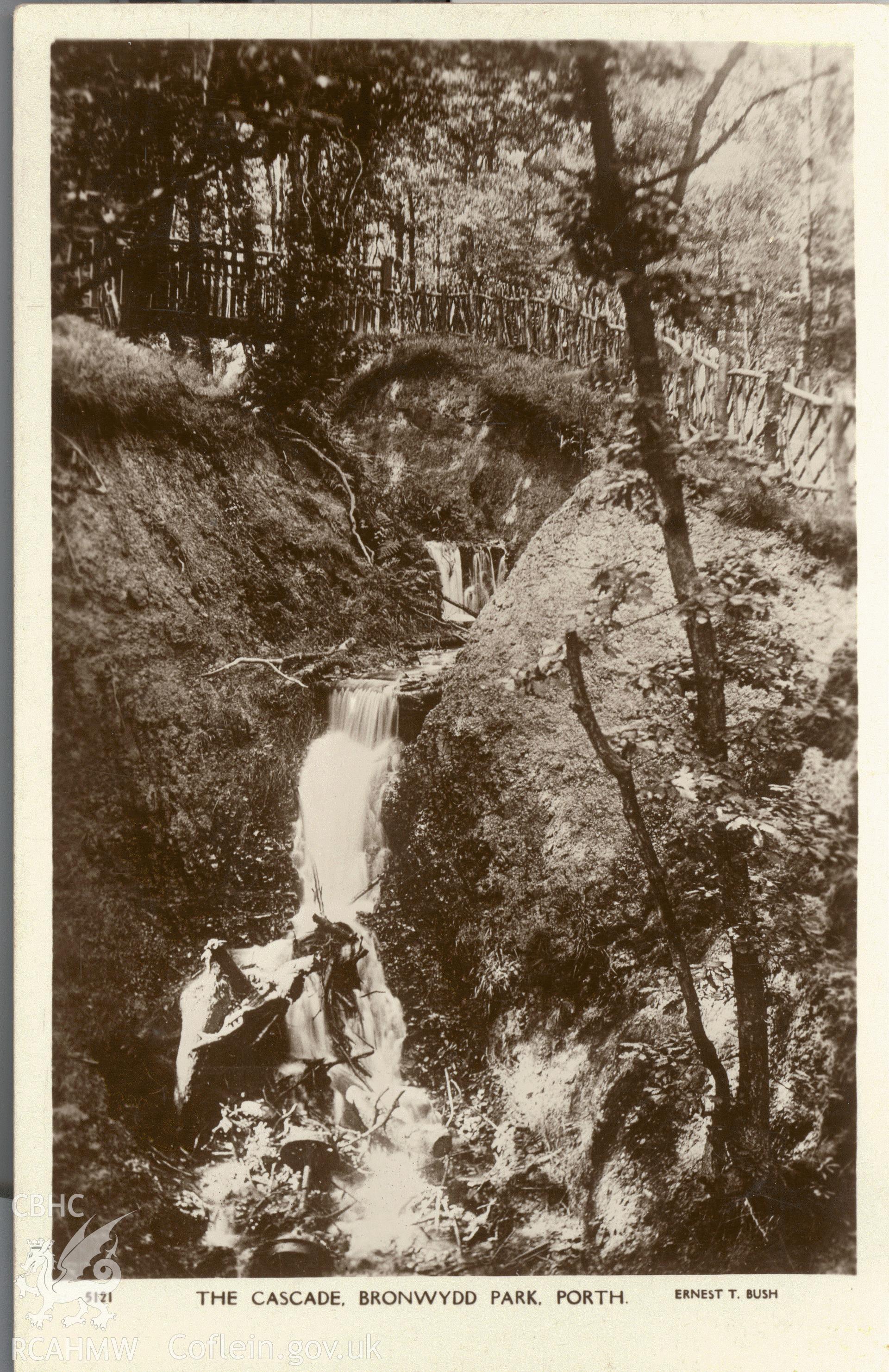 Digitised postcard image of the cascade, Bronwydd Park, Porth, Ernest T. Bush. Produced by Parks and Gardens Data Services, from an original item in the Peter Davis Collection at Parks and Gardens UK. We hold only web-resolution images of this collection, suitable for viewing on screen and for research purposes only. We do not hold the original images, or publication quality scans.